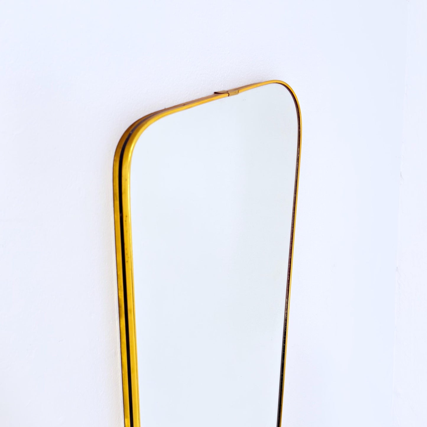 Mid century wall mirror brass framed with black edging 1950s