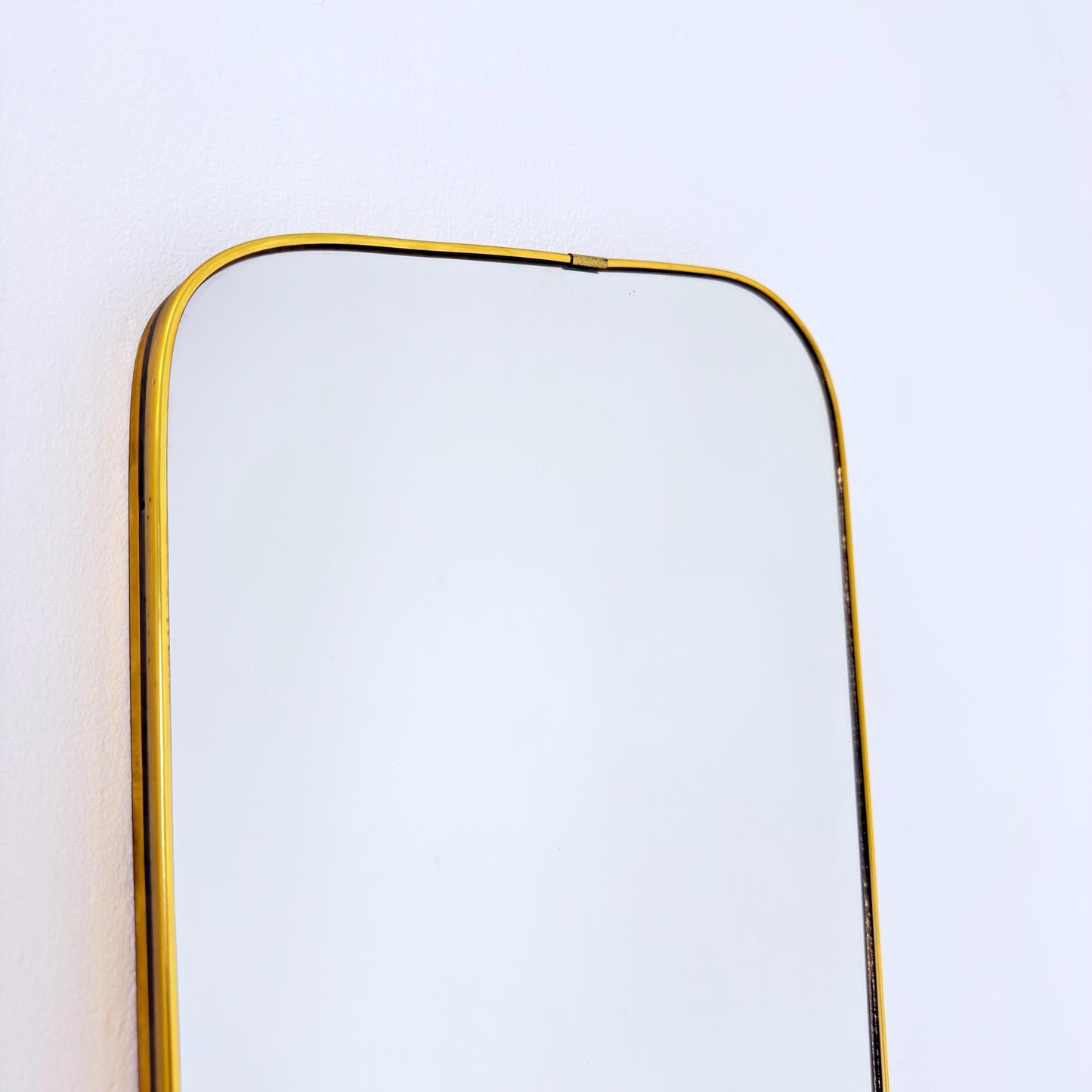 Mid century wall mirror brass framed with black edging 1950s
