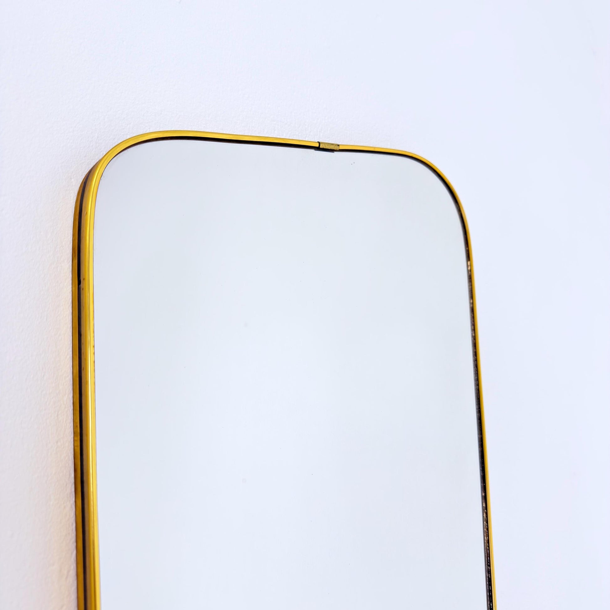 Mid century wall mirror brass framed with black edging 1950s