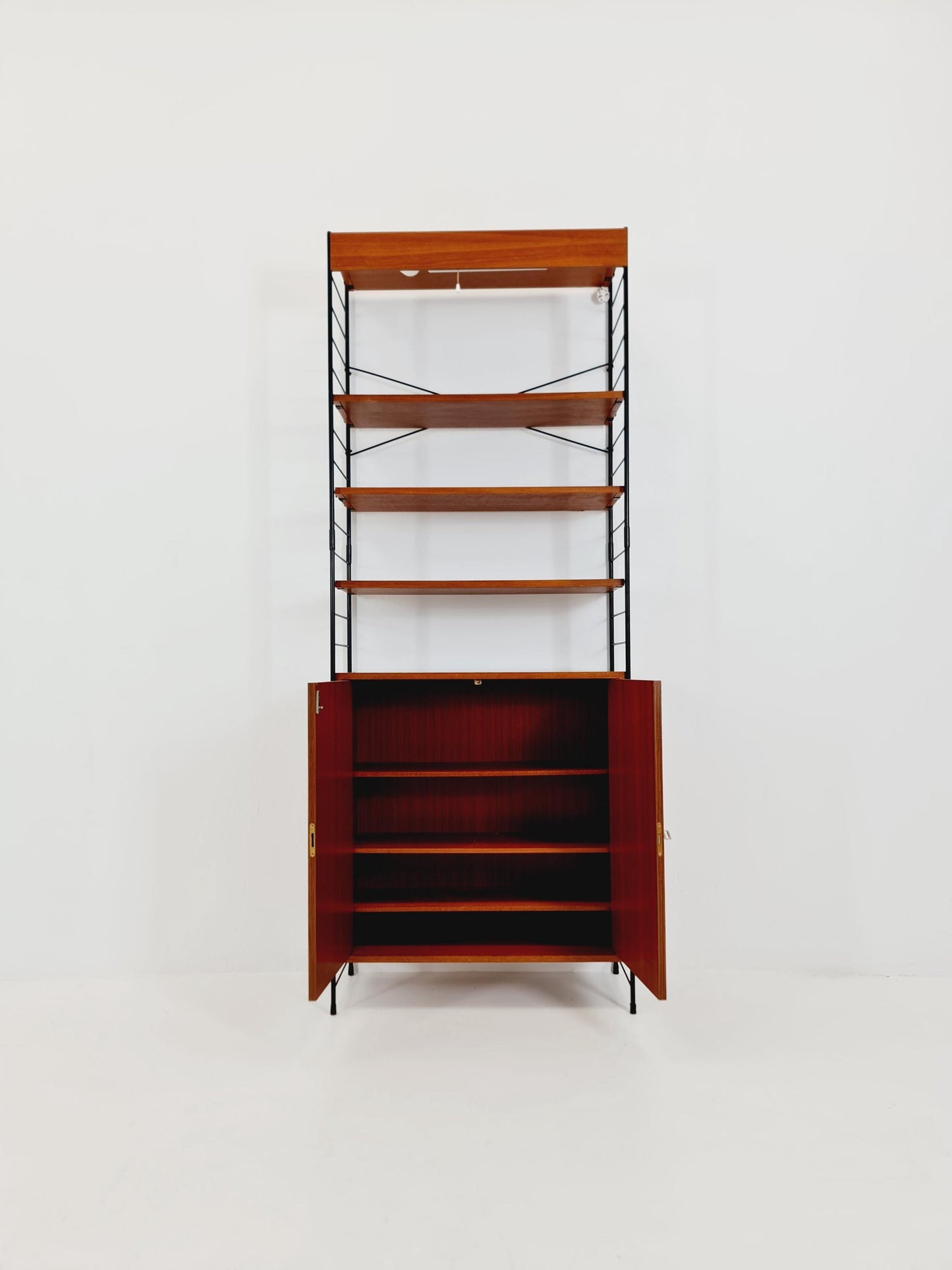 Free standing String shelf-system, bookcase with cabinet and lighting teak by WHB Germany, 1950s