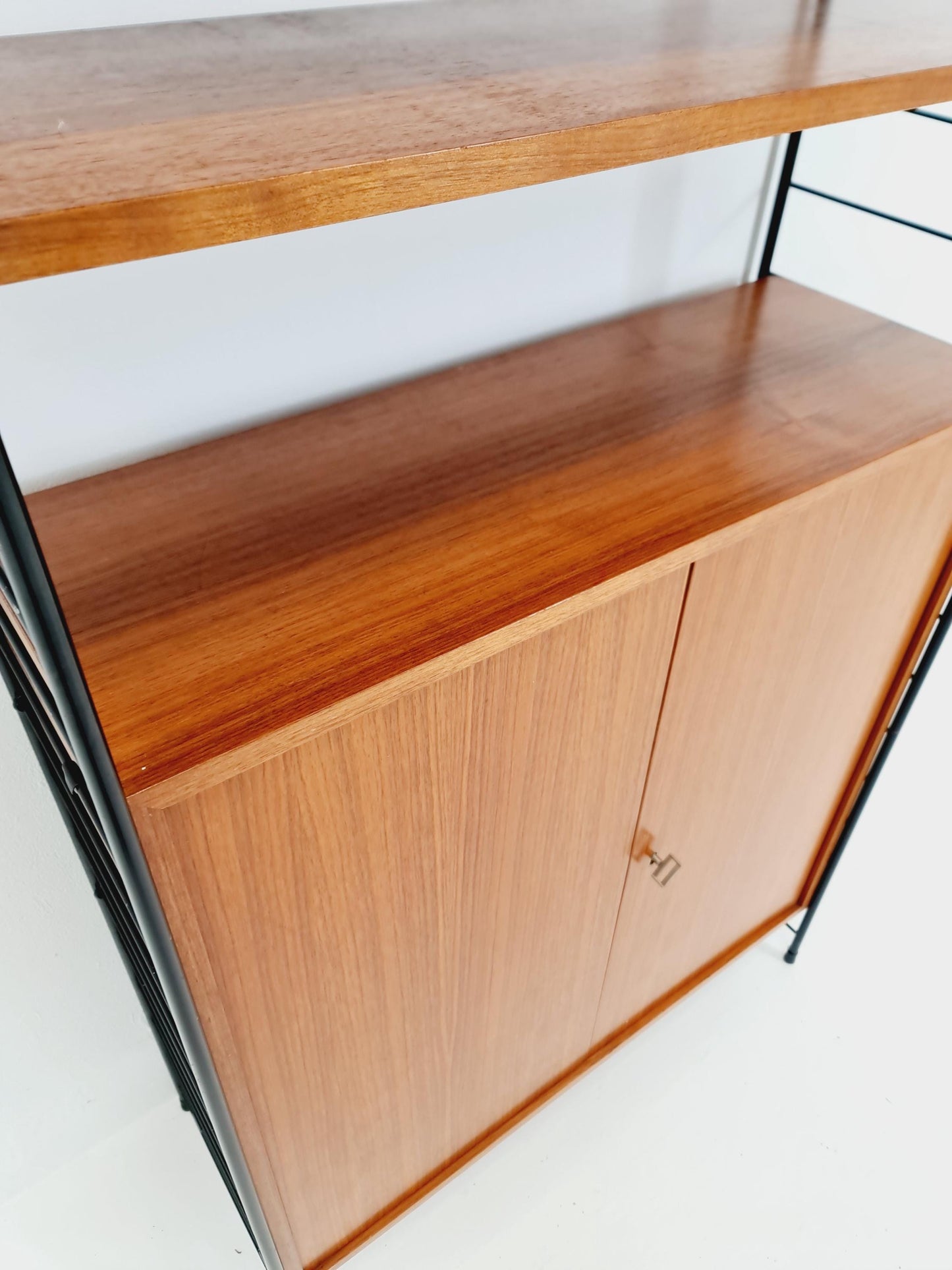 Free standing String shelf-system, bookcase with cabinet and lighting teak by WHB Germany, 1950s