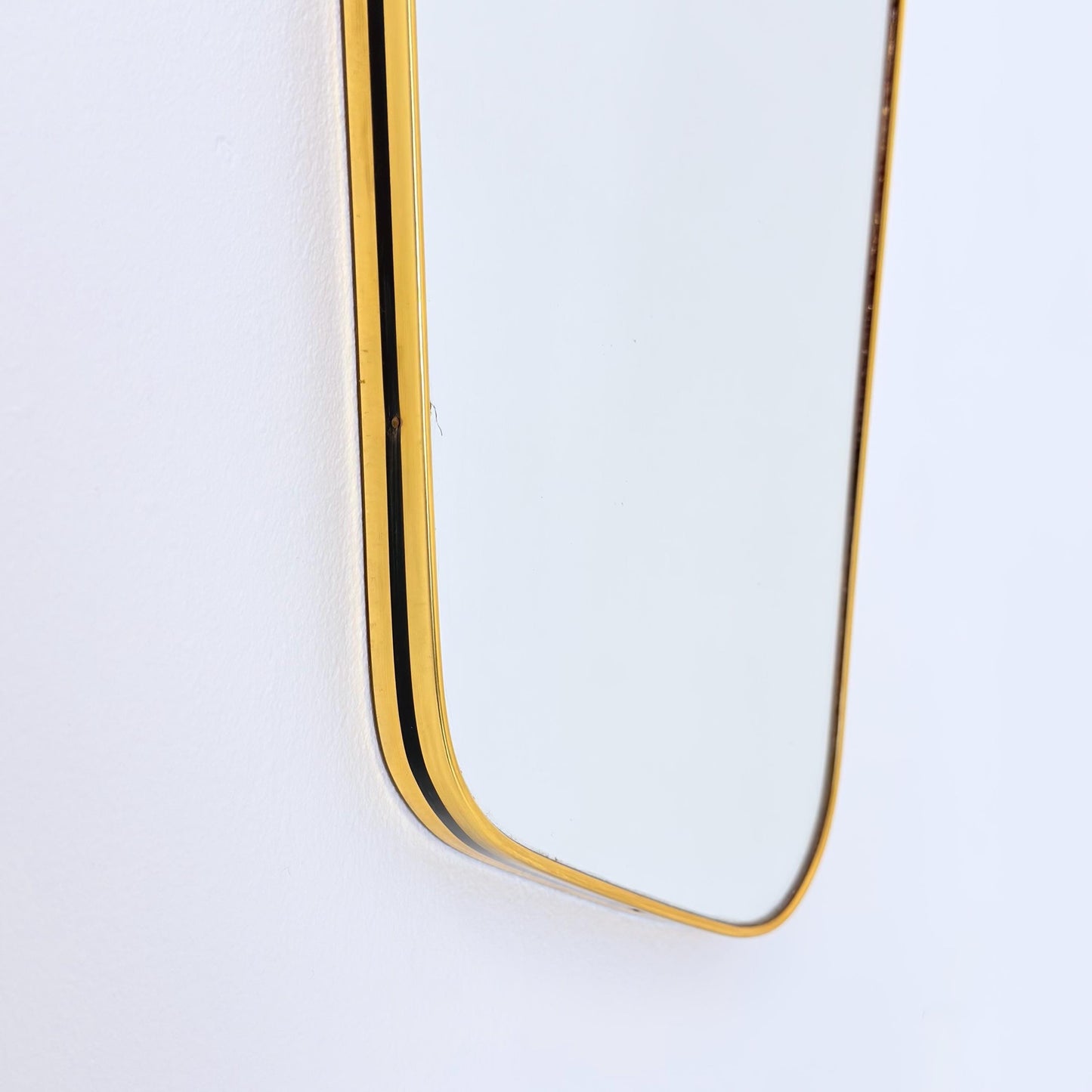 Mid century wall mirror brass framed with black edging 1950s