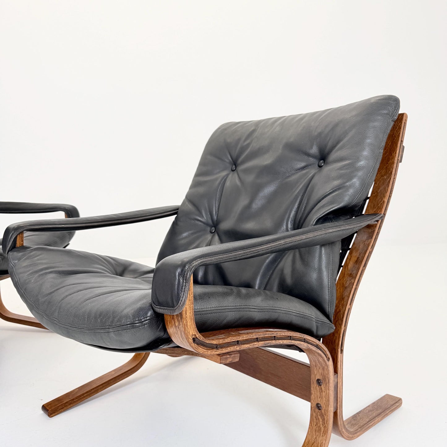 Set of 2 Mid century Ingmar Relling Danish Modern Siesta leather Chair low Back and Armrests from Westnofa Norway 1960s