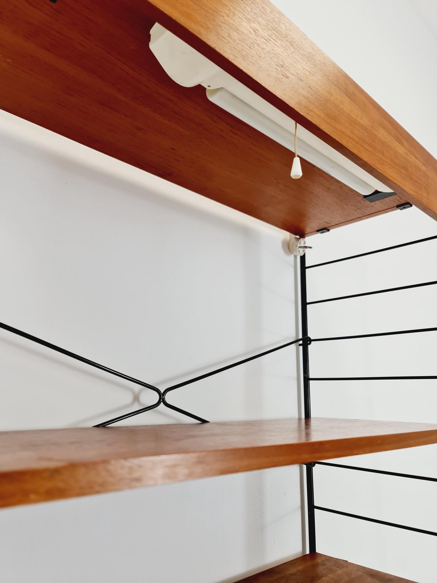 Free standing String shelf-system, bookcase with cabinet and lighting teak by WHB Germany, 1950s