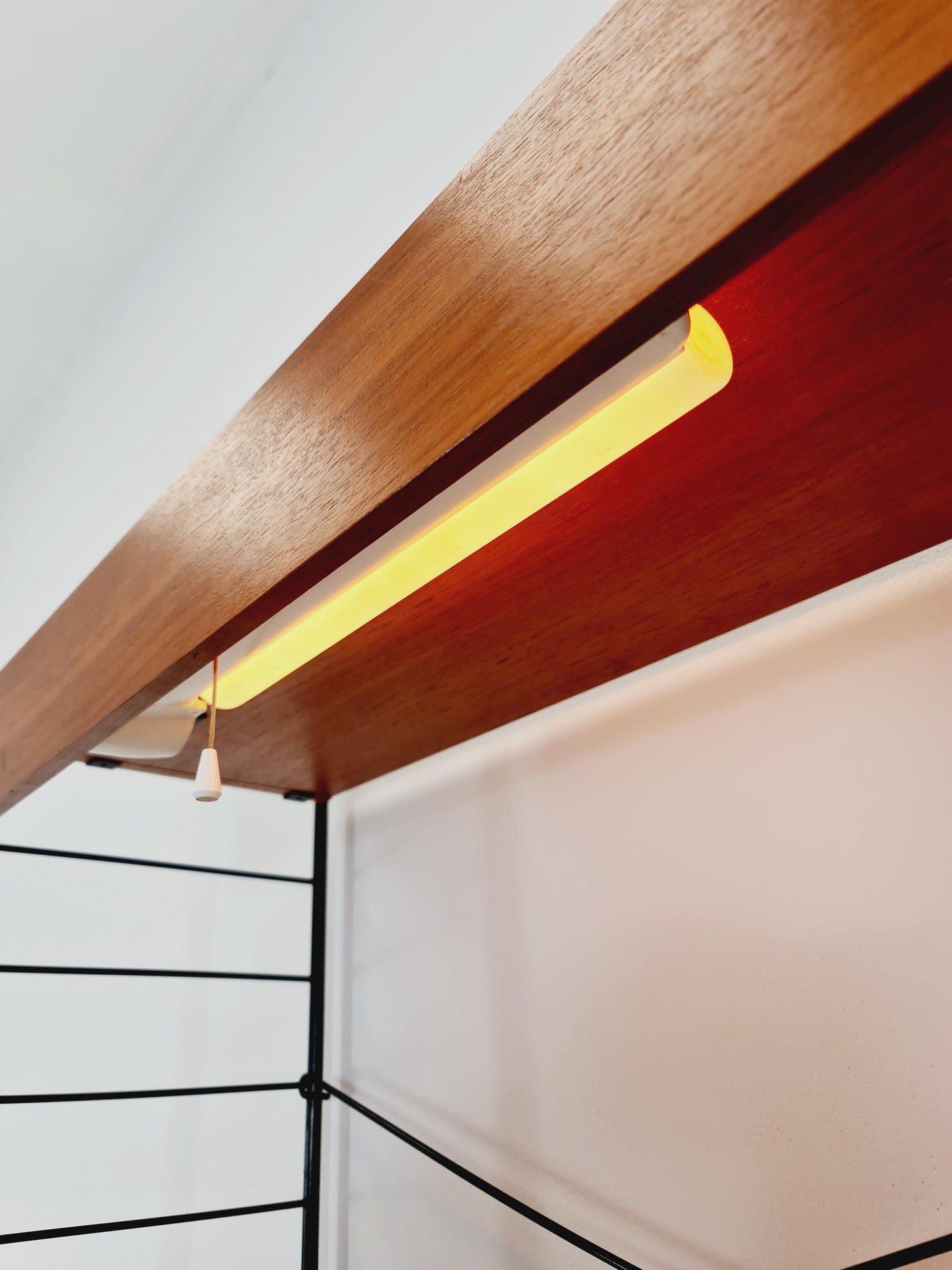 Free standing String shelf-system, bookcase with cabinet and lighting teak by WHB Germany, 1950s