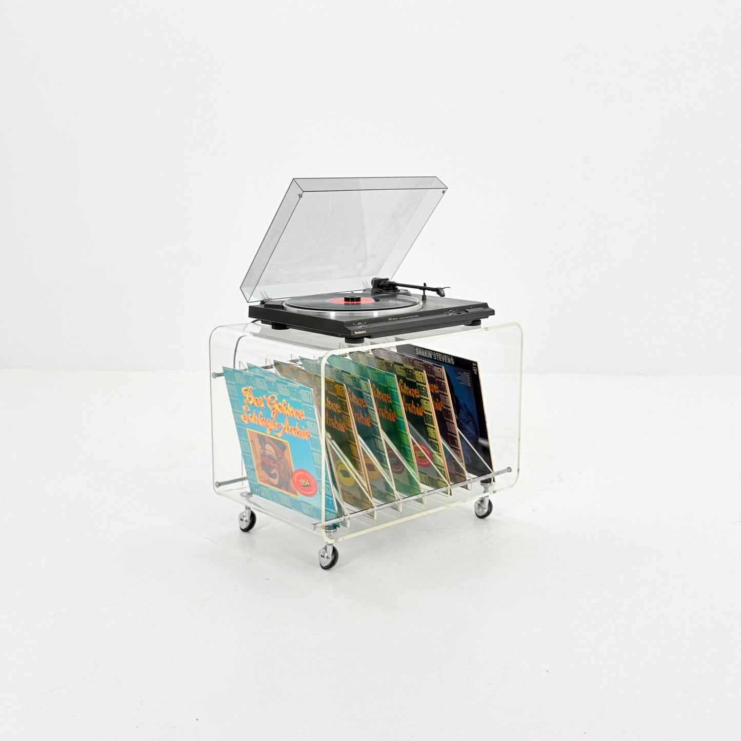 Space age Smoked Plexiglass vinyl storage /Trolley by Michel Dumas for Roche Bobois 1970s