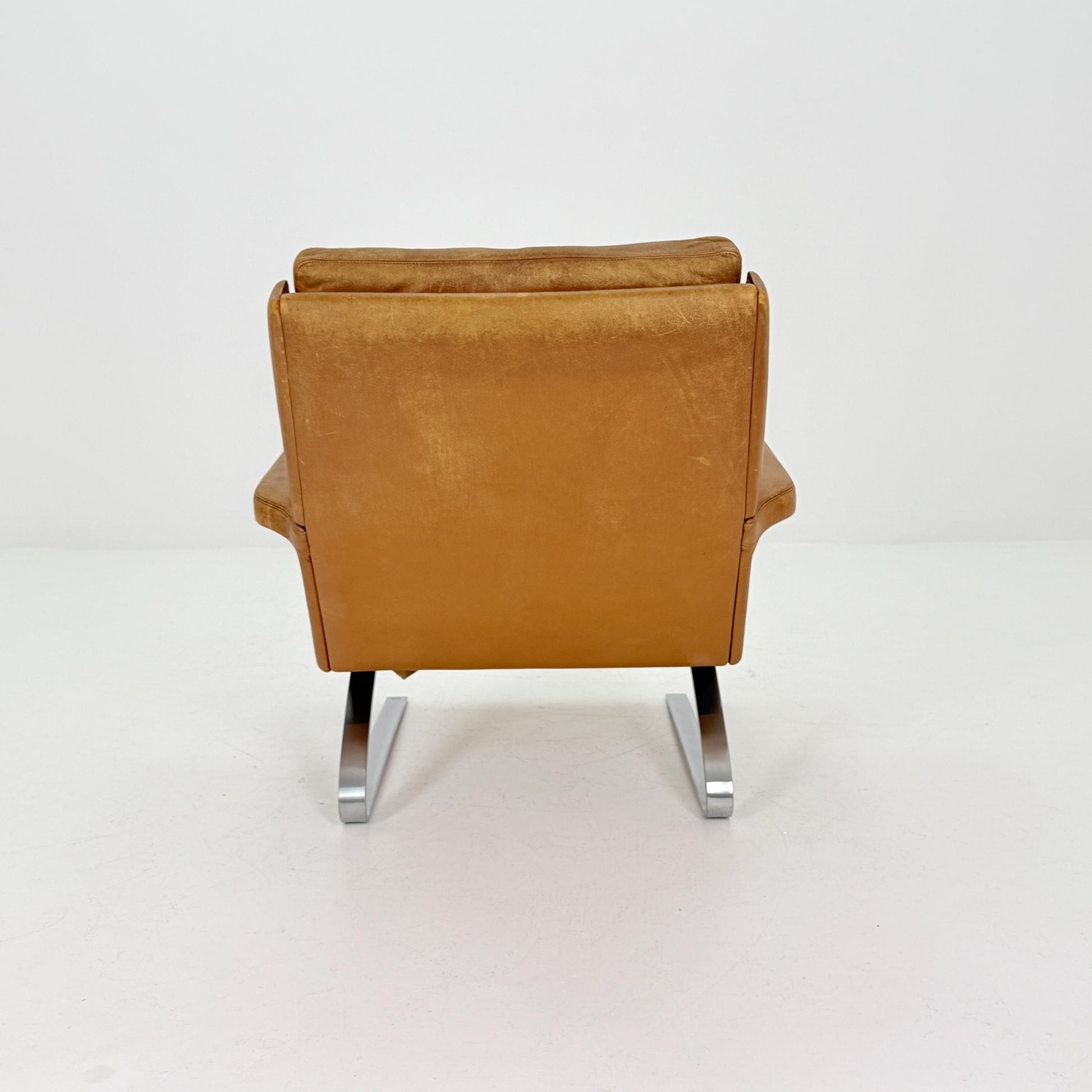 Mid Century Swing Lounge Chair by Reinhold Adolf & Hans-Jürgen Schröpfer for COR – Cognac Leather - Chrome Steel, Germany 1970s