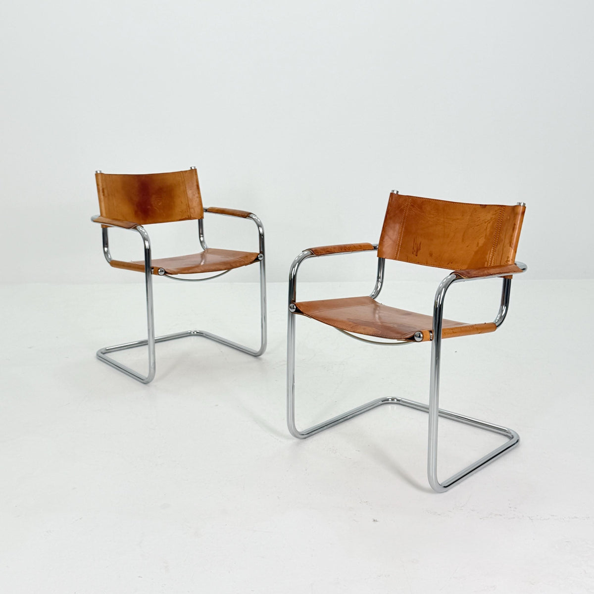 Set of 2 Mid century Bauhaus cognac armchairs by Mart stam & Marcel Brauer for Steel Line 1990s Italy