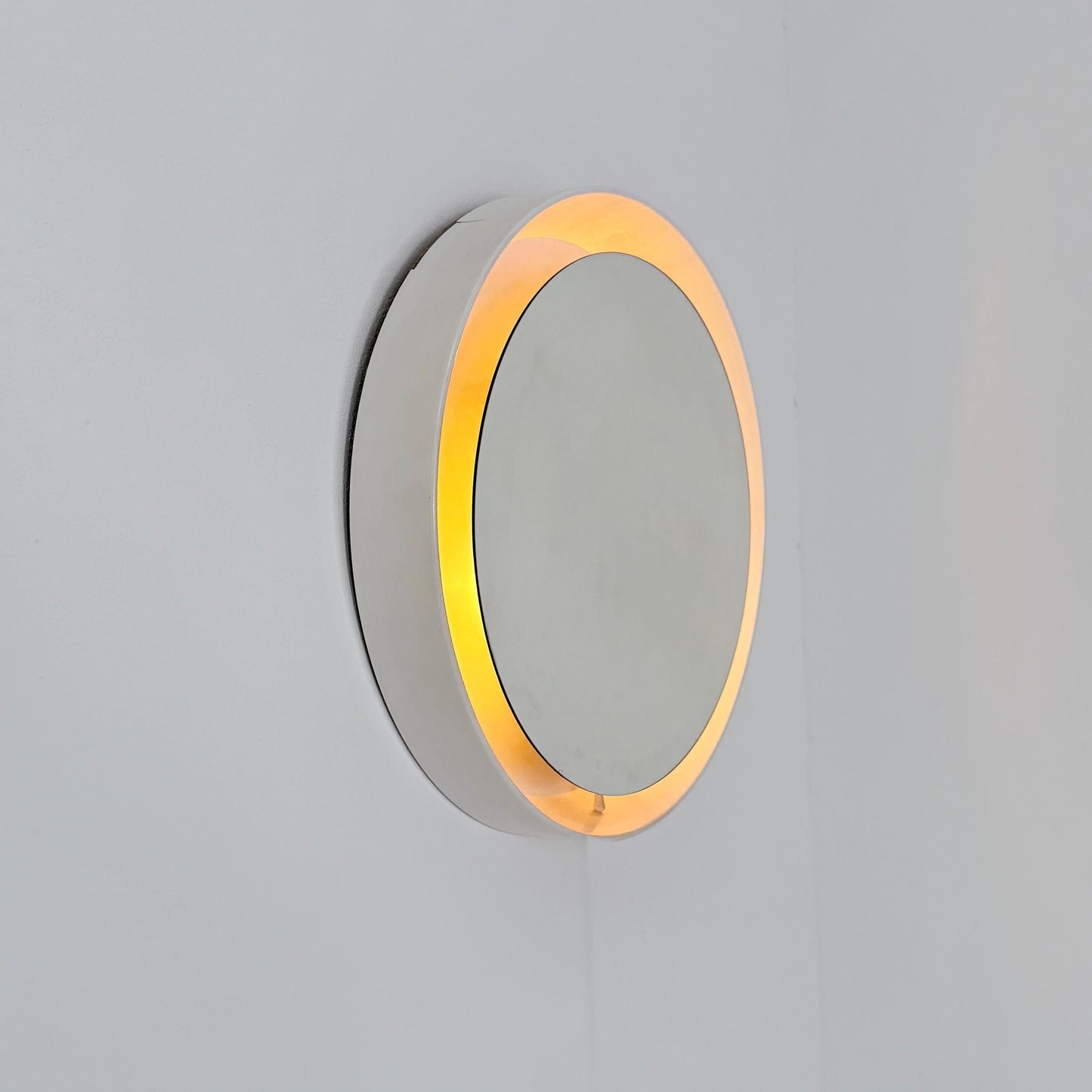 Mid century vintage wall illuminated mirror backlit with a cream plastic frame Sweden 1970s