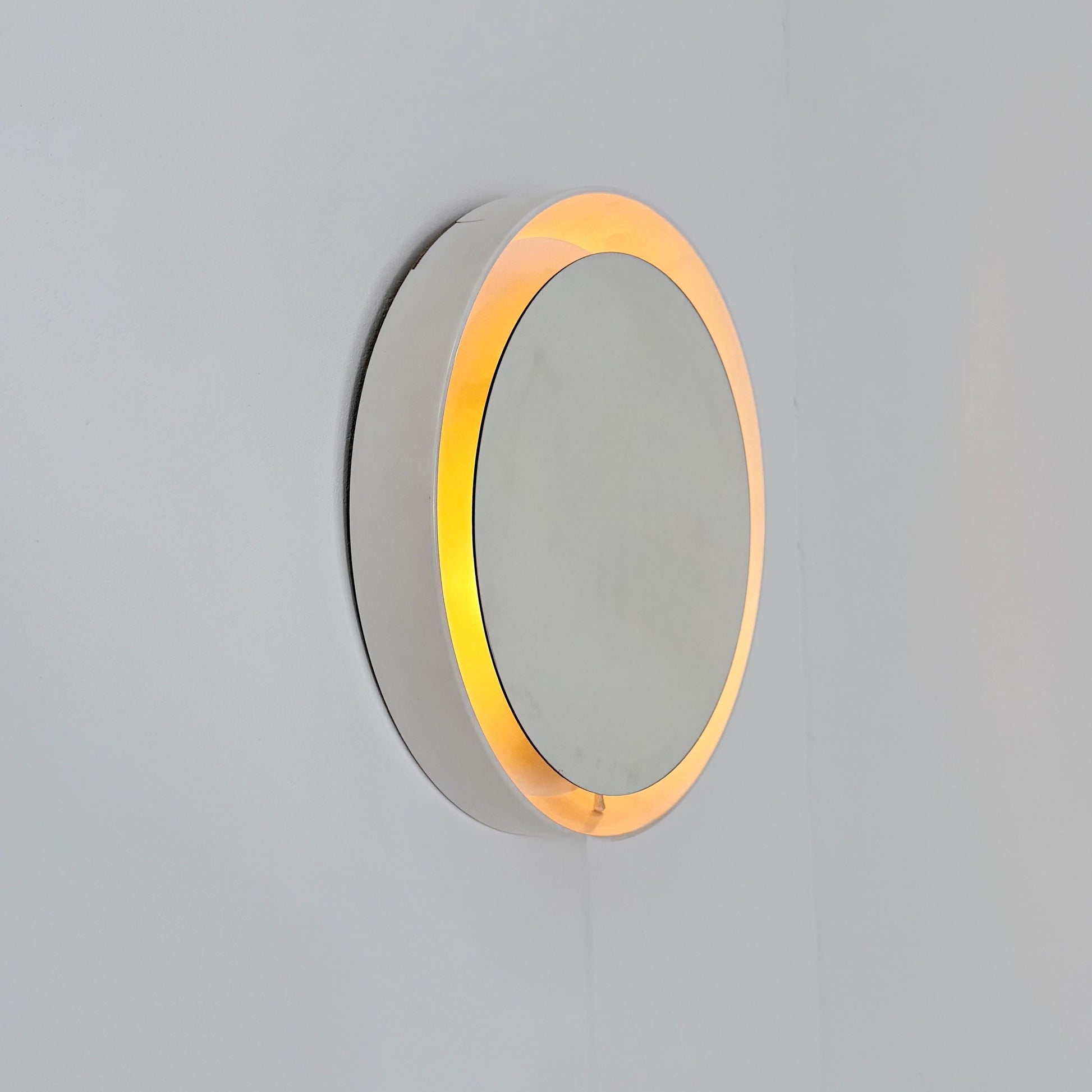 Mid century vintage wall illuminated mirror backlit with a cream plastic frame Sweden 1970s