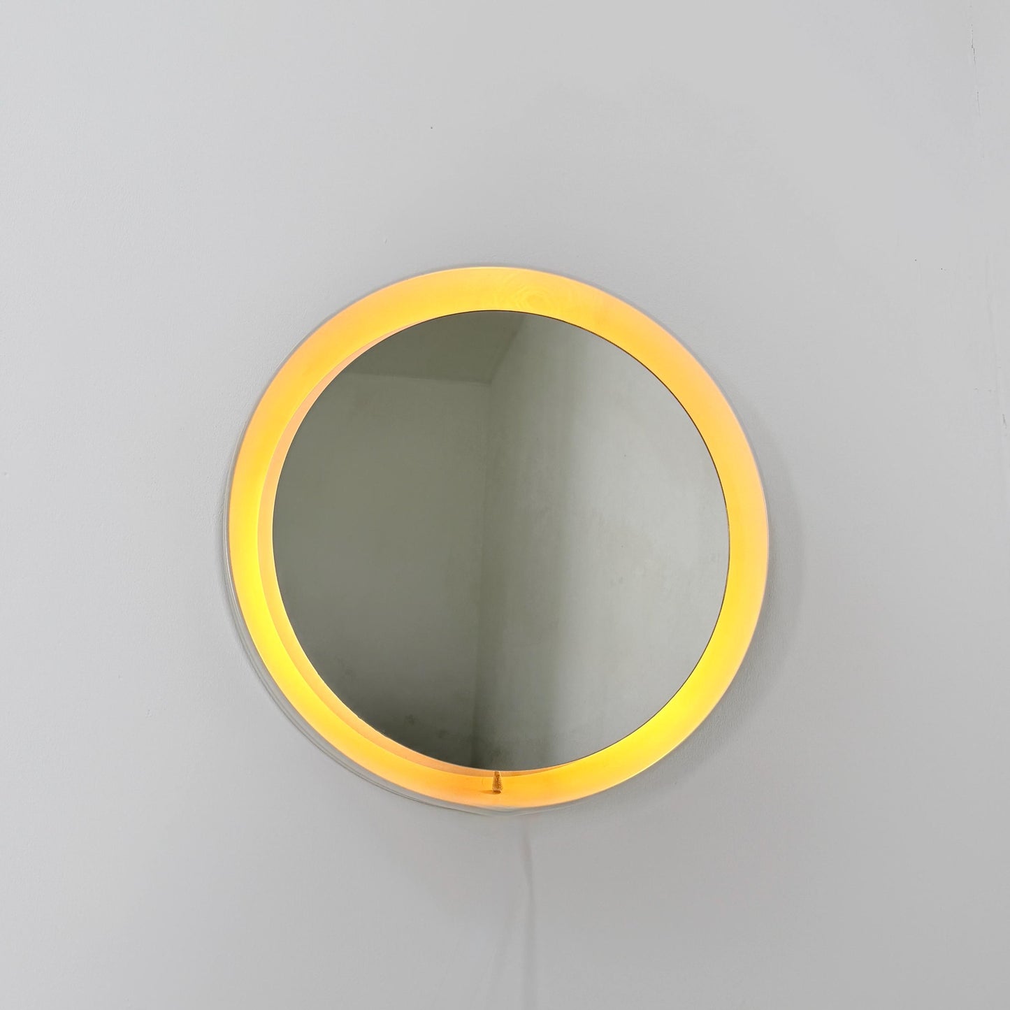 Mid century vintage wall illuminated mirror backlit with a cream plastic frame Sweden 1970s