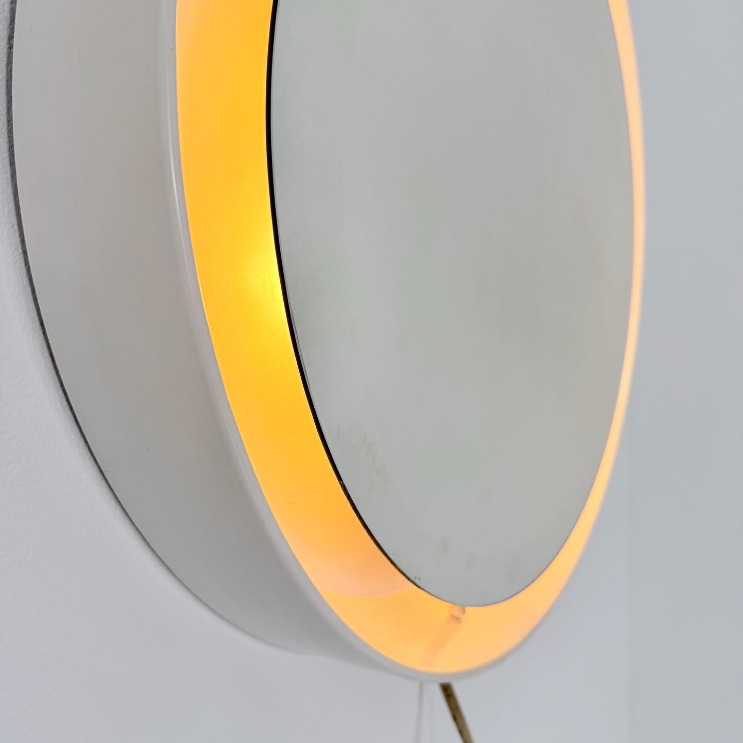 Mid century vintage wall illuminated mirror backlit with a cream plastic frame Sweden 1970s