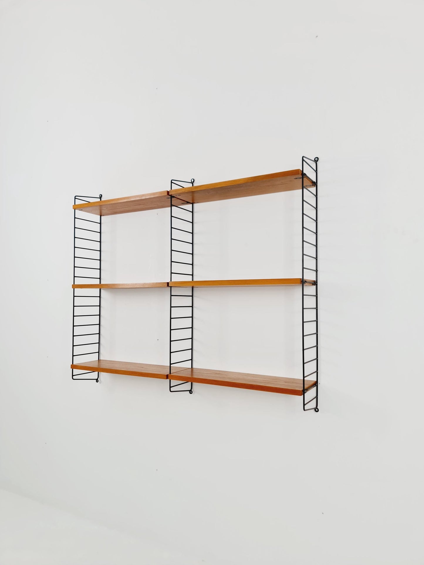 Original MCM Ash wood shelving system - consists of Black lacquered metal ladders, from string Stockholm 1960s