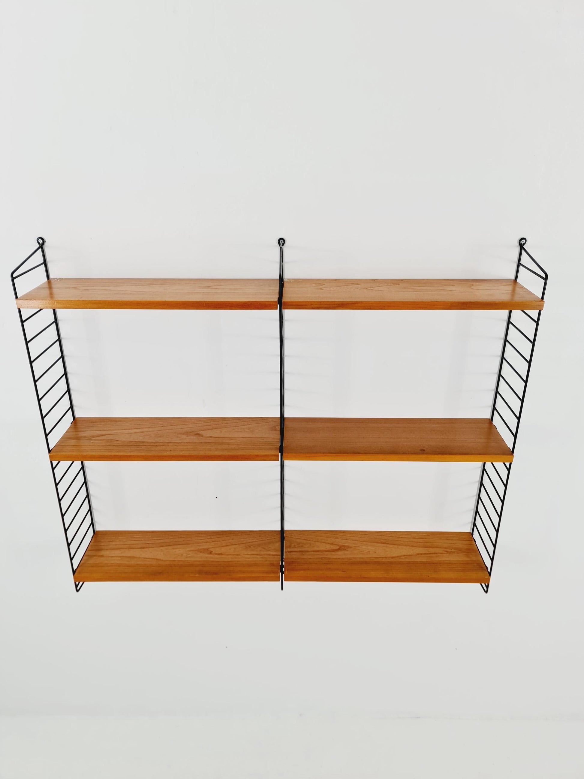 Original MCM Ash wood shelving system - consists of Black lacquered metal ladders, from string Stockholm 1960s