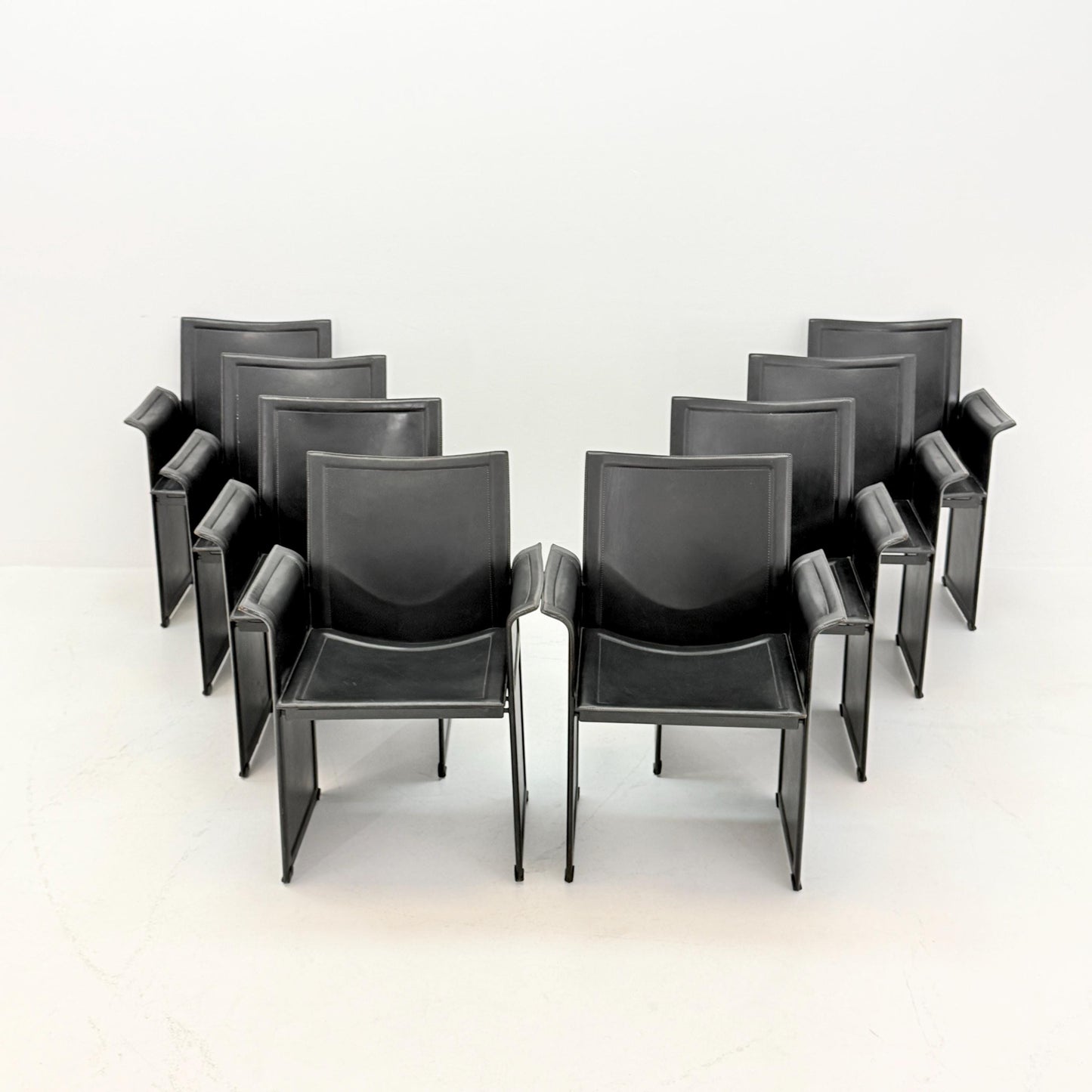 Set of 8 Mid-Century Italian “Korium” KM1 Black Leather Armchair by Tito Agnoli for Matteo Grassi, 1970s Italy
