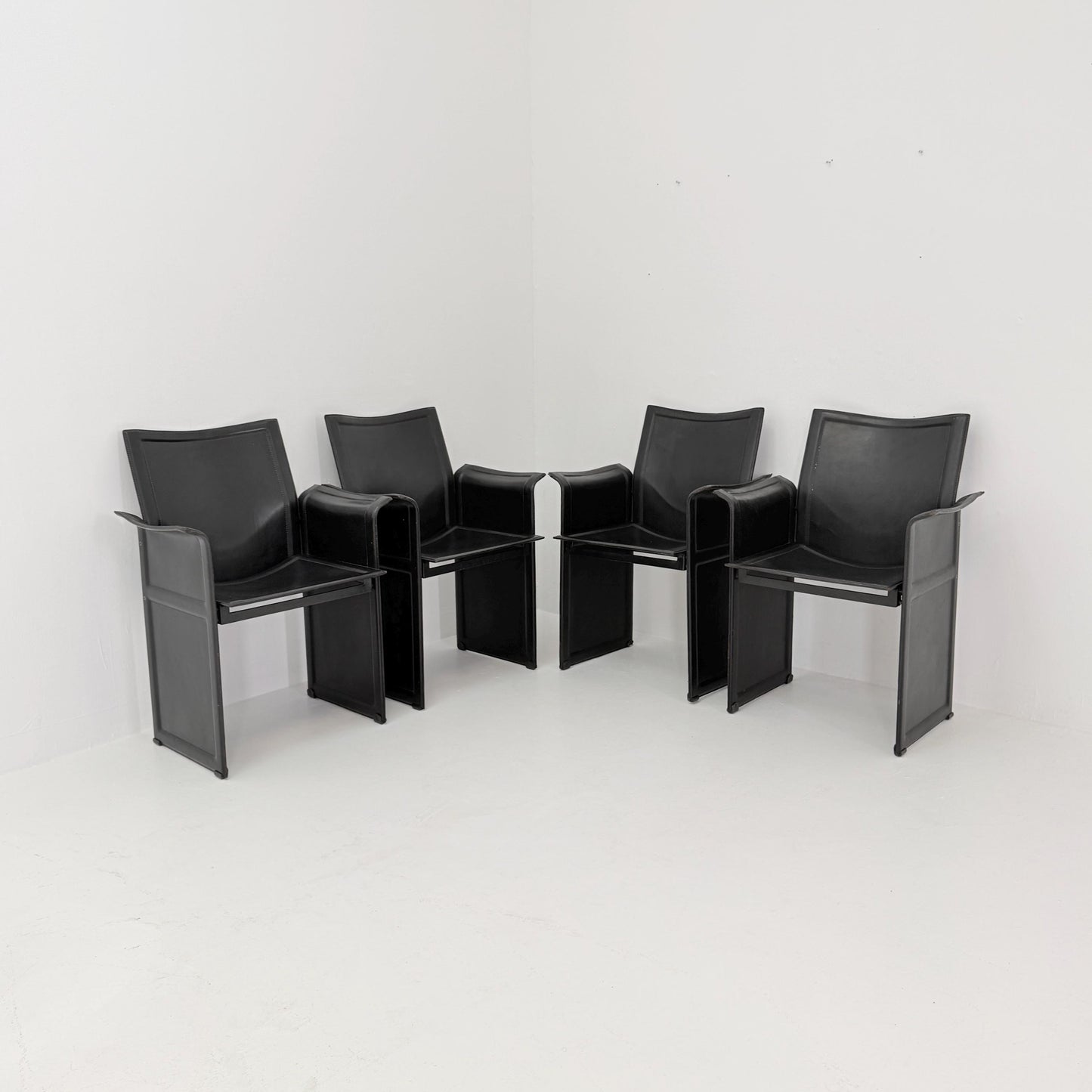 Set of 8 Mid-Century Italian “Korium” KM1 Black Leather Armchair by Tito Agnoli for Matteo Grassi, 1970s Italy