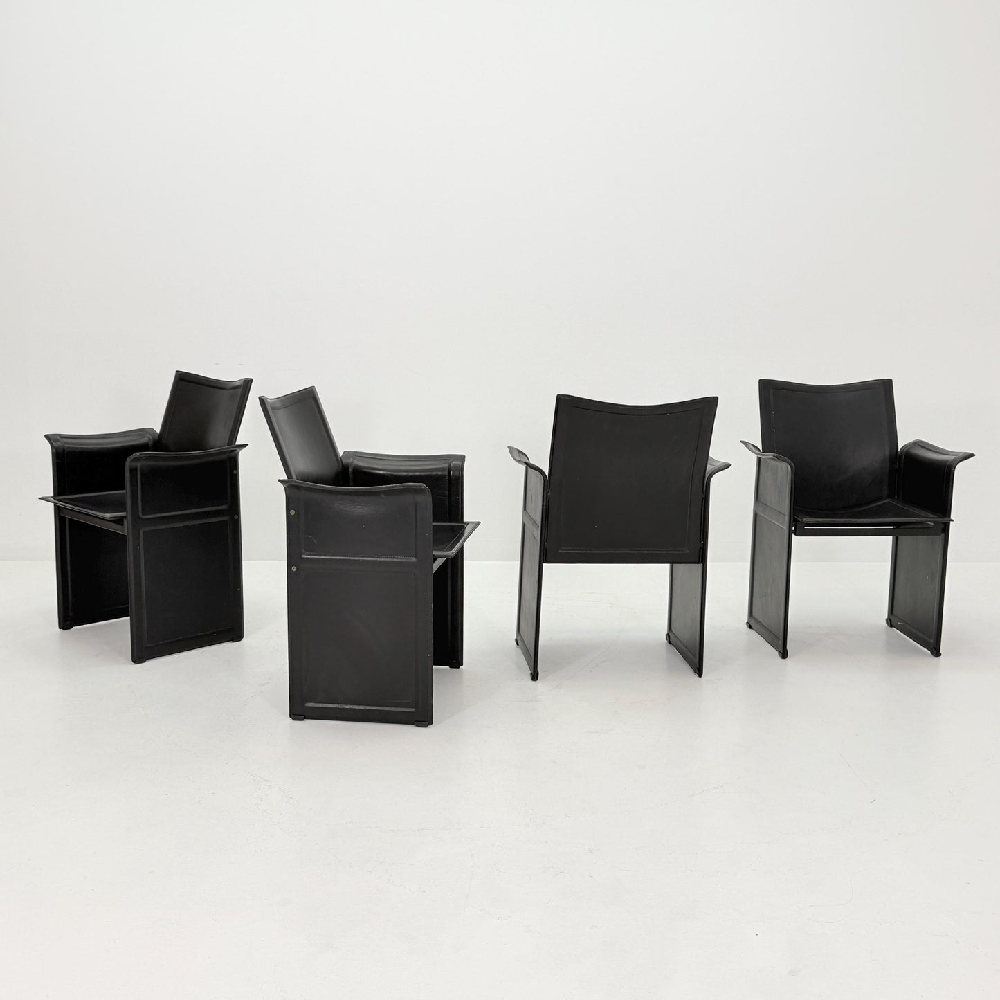 Set of 4 Mid-Century Italian “Korium” KM1 Black Leather Armchair by Tito Agnoli for Matteo Grassi, 1970s Italy