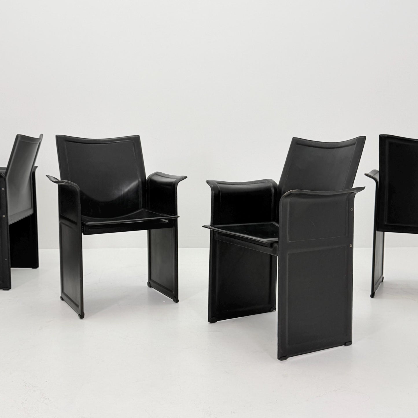Set of 4 Mid-Century Italian “Korium” KM1 Black Leather Armchair by Tito Agnoli for Matteo Grassi, 1970s Italy