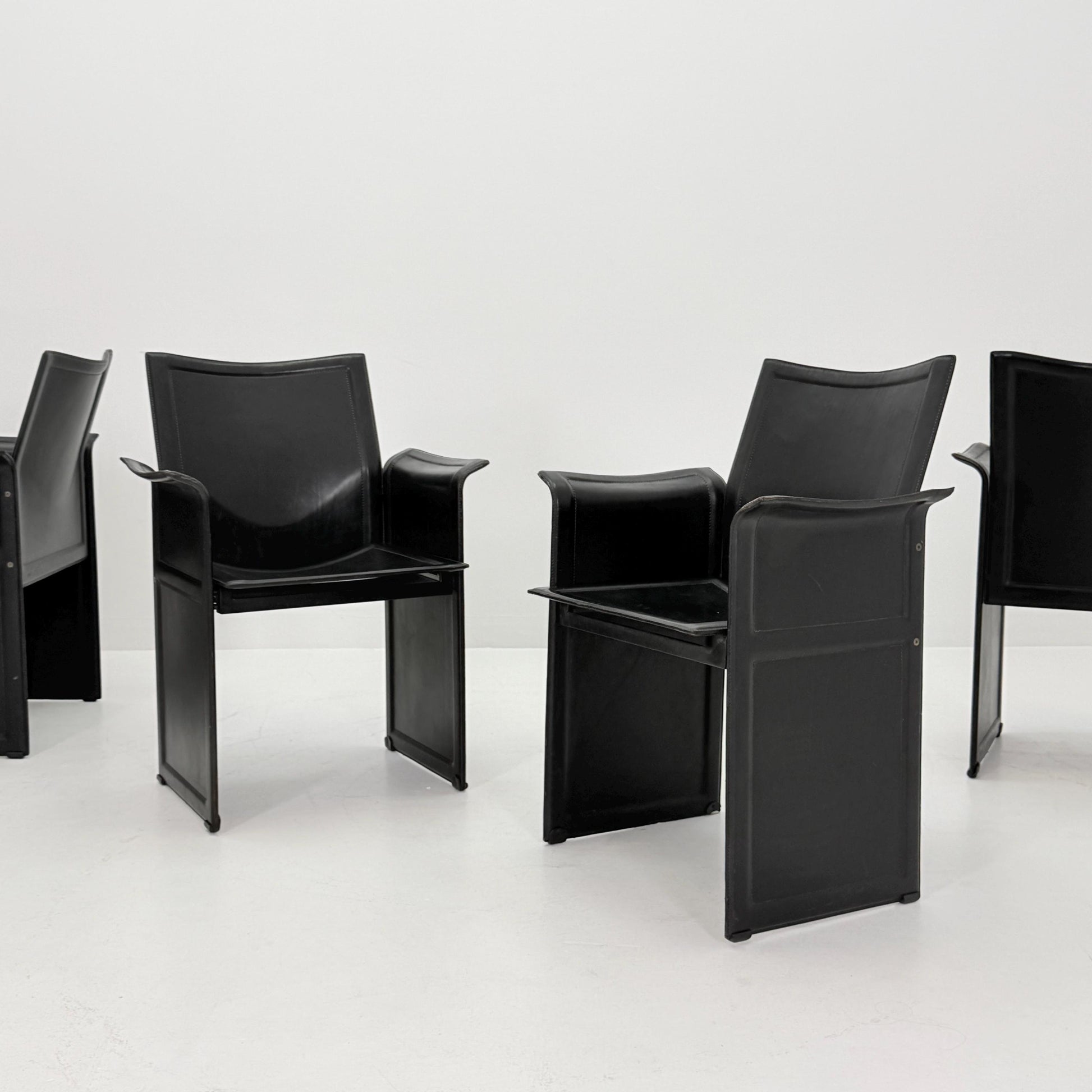 Set of 4 Mid-Century Italian “Korium” KM1 Black Leather Armchair by Tito Agnoli for Matteo Grassi, 1970s Italy