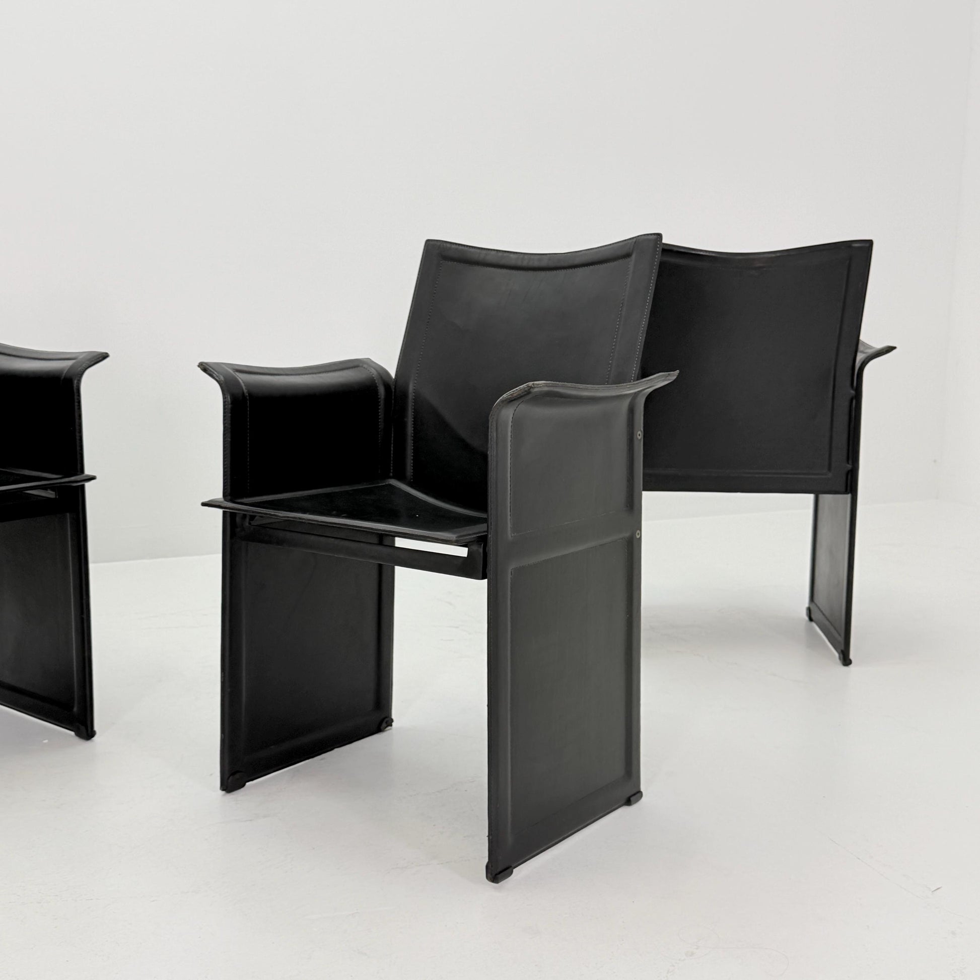 Set of 4 Mid-Century Italian “Korium” KM1 Black Leather Armchair by Tito Agnoli for Matteo Grassi, 1970s Italy