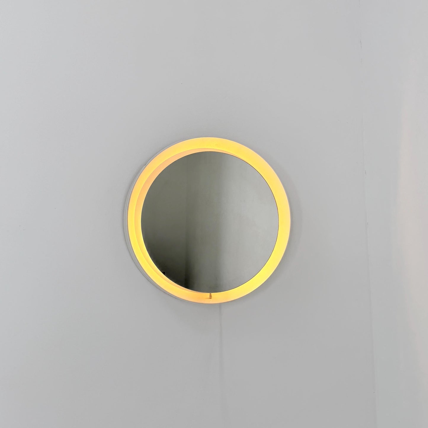 Mid century vintage wall illuminated mirror backlit with a cream plastic frame Sweden 1970s