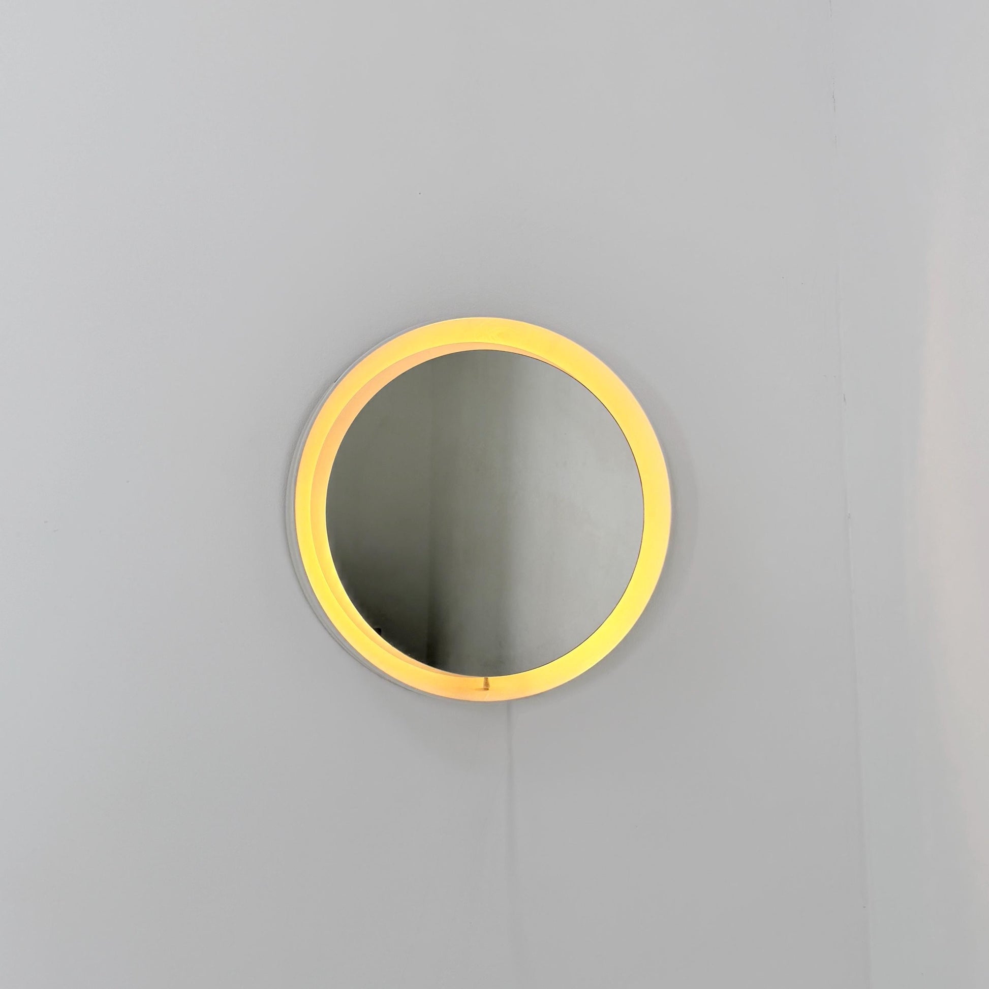 Mid century vintage wall illuminated mirror backlit with a cream plastic frame Sweden 1970s