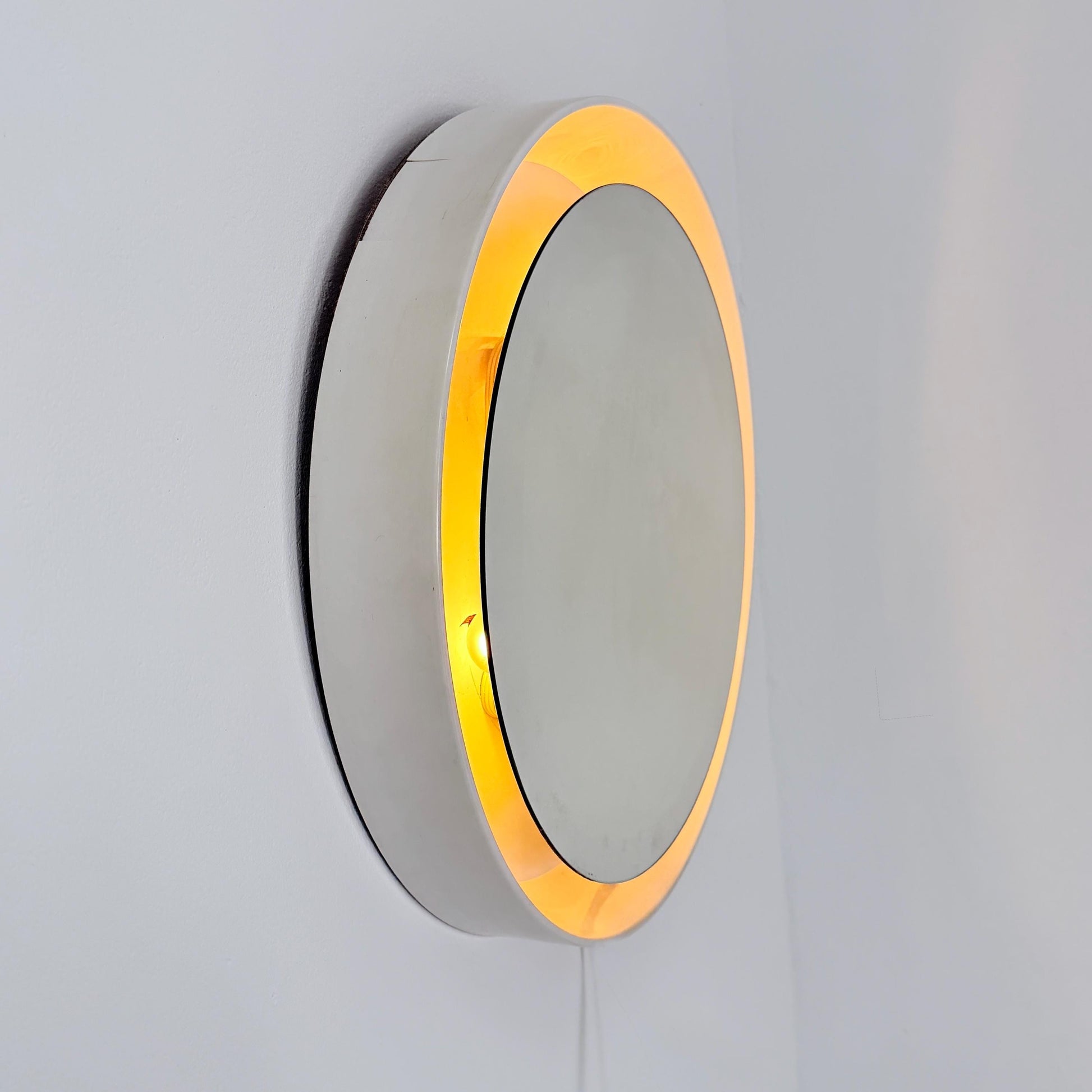 Mid century vintage wall illuminated mirror backlit with a cream plastic frame Sweden 1970s