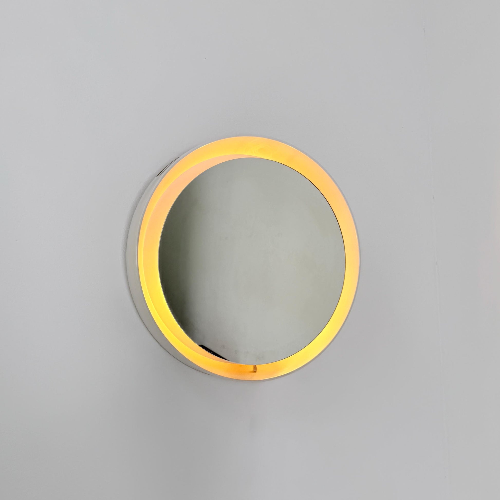 Mid century vintage wall illuminated mirror backlit with a cream plastic frame Sweden 1970s