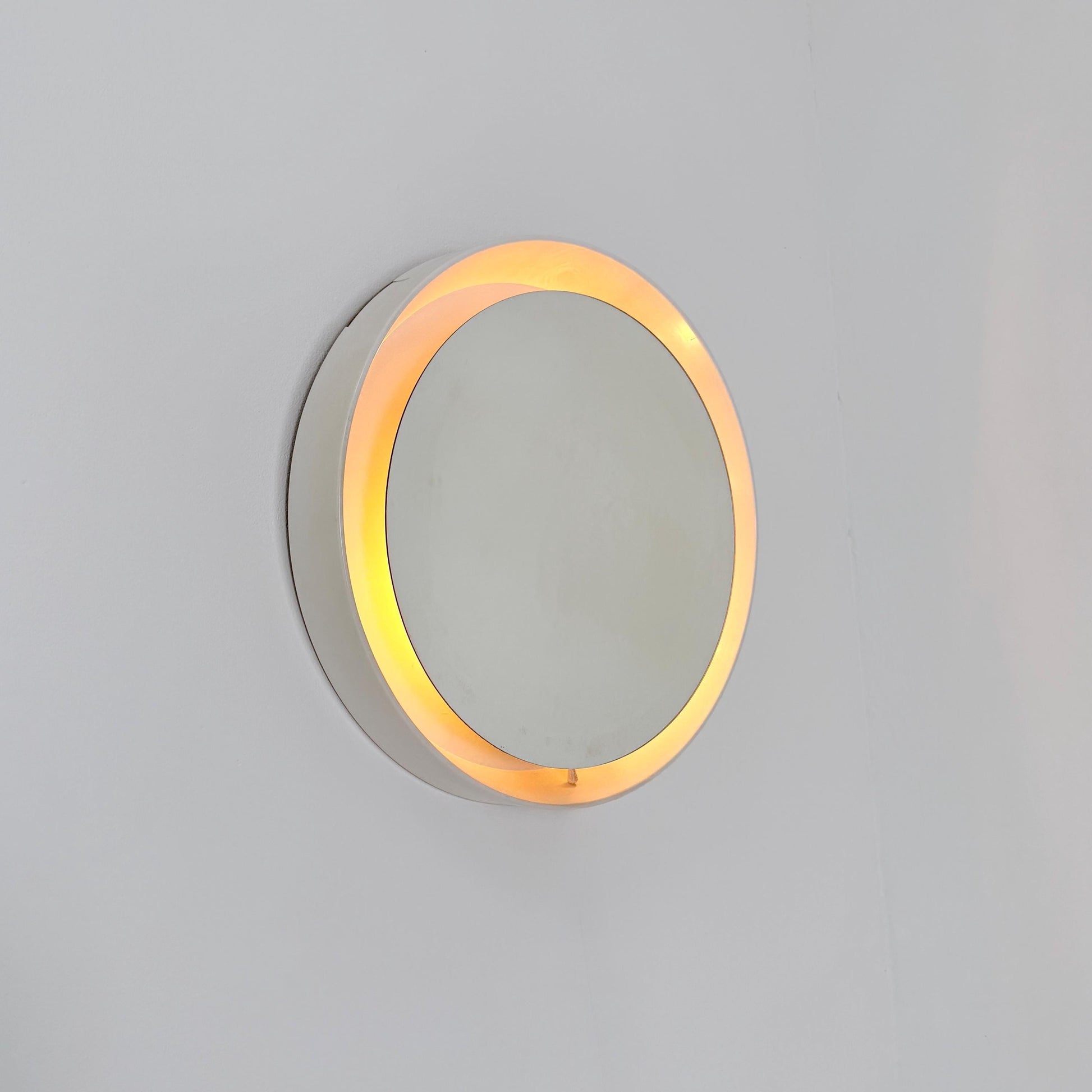 Mid century vintage wall illuminated mirror backlit with a cream plastic frame Sweden 1970s