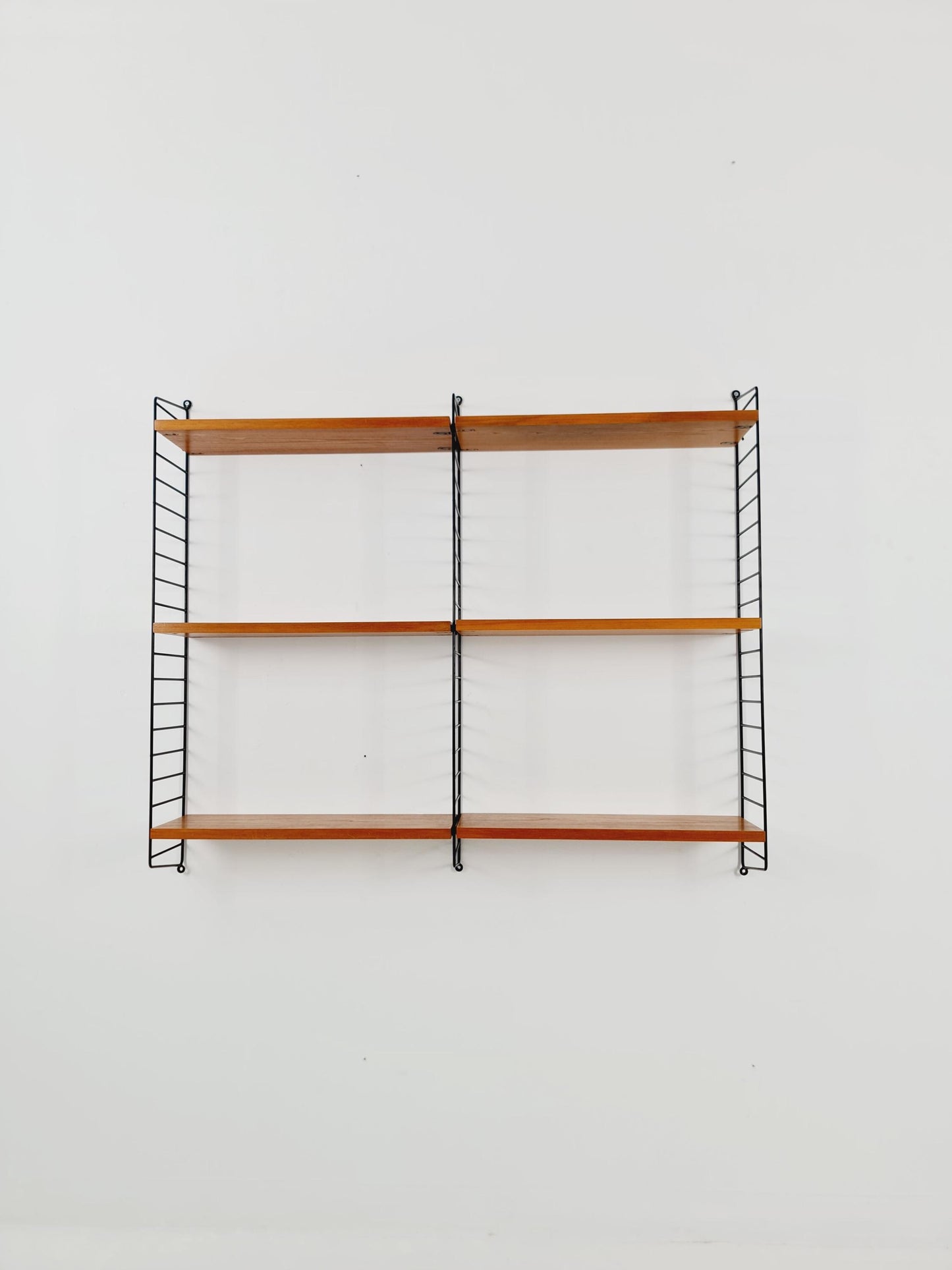 Original MCM Ash wood shelving system - consists of Black lacquered metal ladders, from string Stockholm 1960s