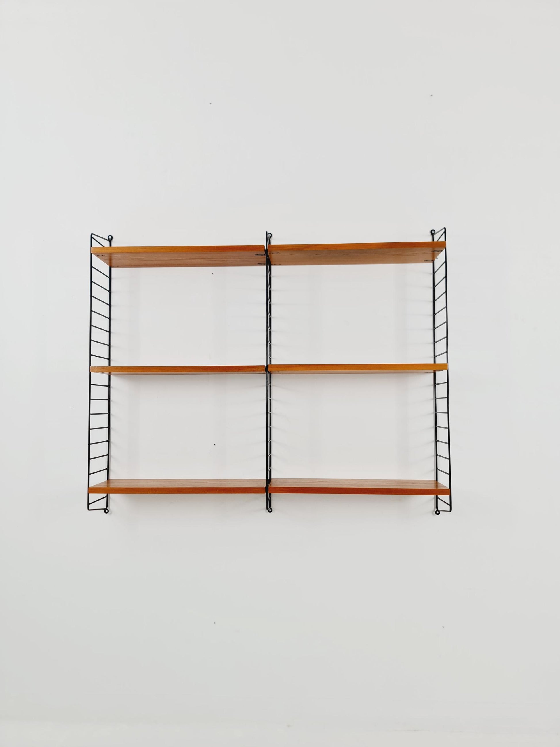 Original MCM Ash wood shelving system - consists of Black lacquered metal ladders, from string Stockholm 1960s