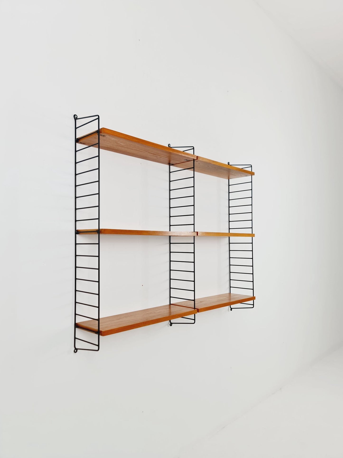 Original MCM Ash wood shelving system - consists of Black lacquered metal ladders, from string Stockholm 1960s
