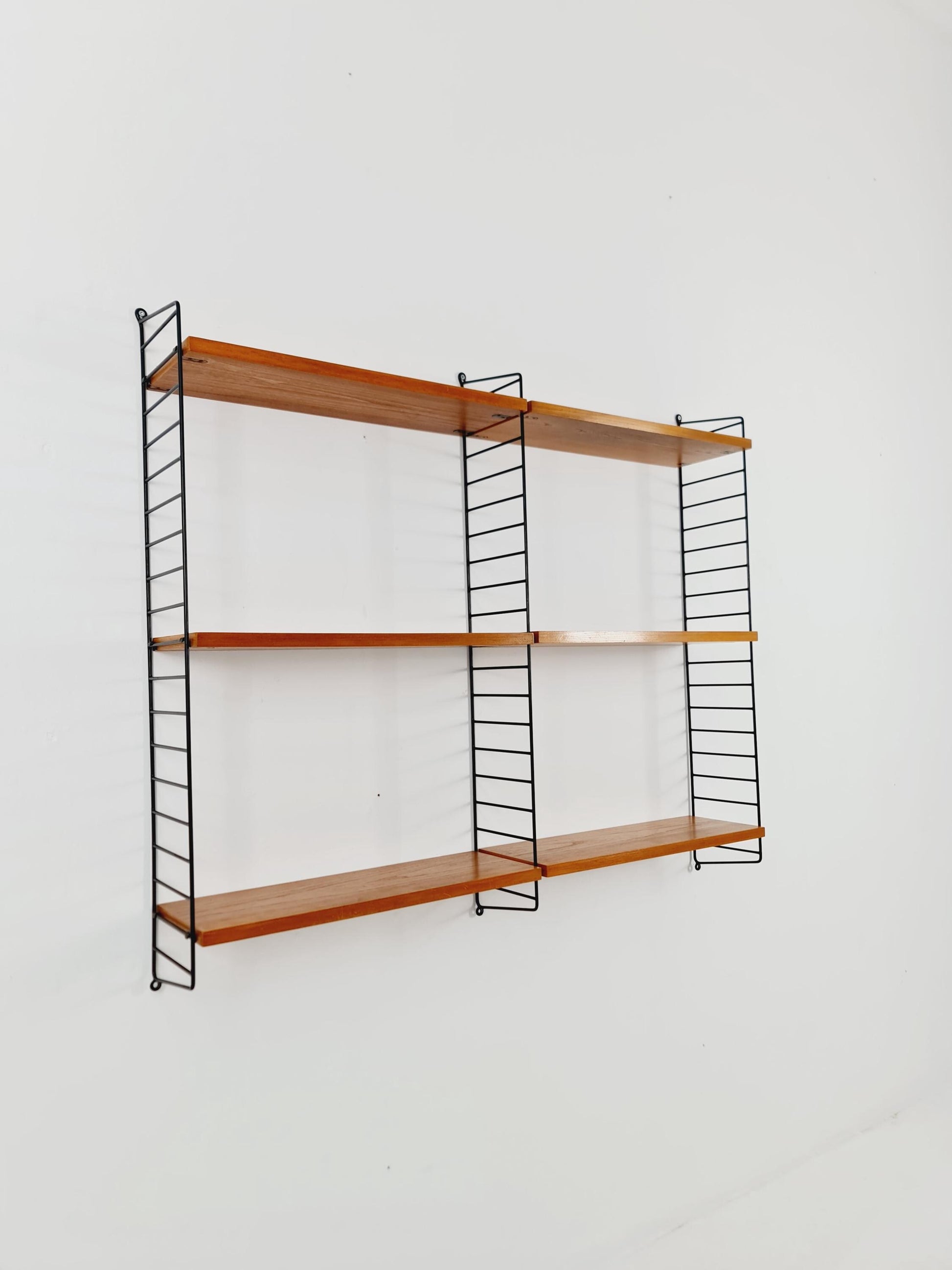 Original MCM Ash wood shelving system - consists of Black lacquered metal ladders, from string Stockholm 1960s