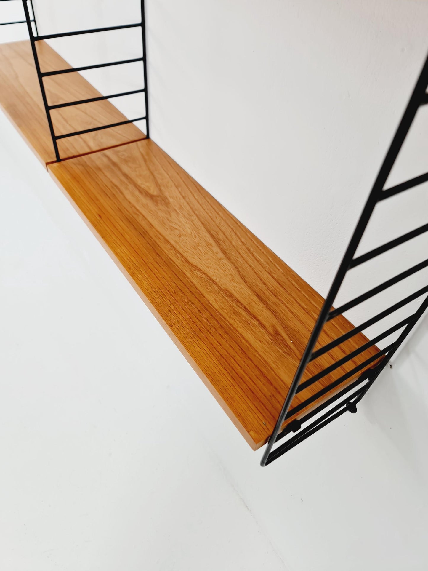 Original MCM Ash wood shelving system - consists of Black lacquered metal ladders, from string Stockholm 1960s