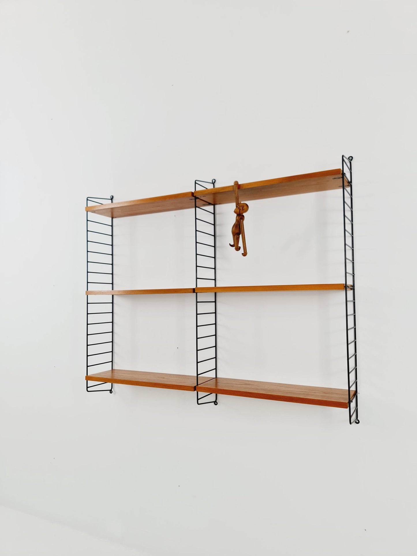 Original MCM Ash wood shelving system - consists of Black lacquered metal ladders, from string Stockholm 1960s