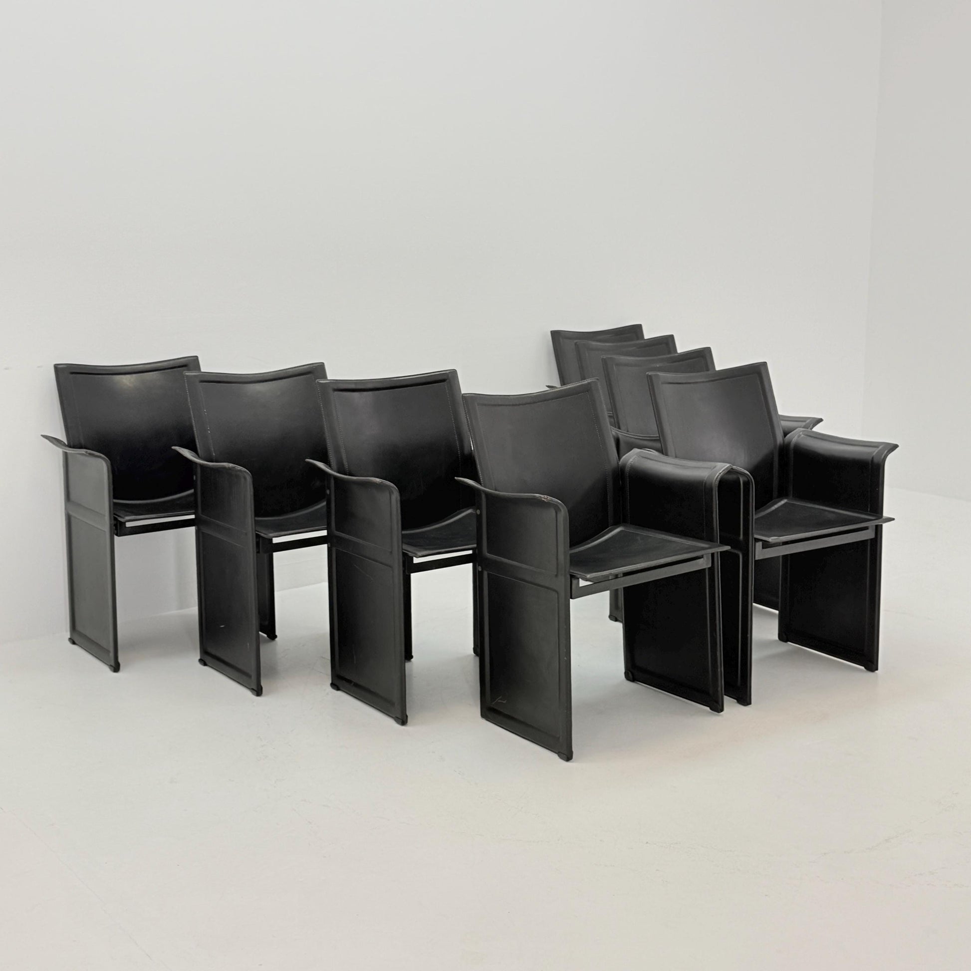Set of 8 Mid-Century Italian “Korium” KM1 Black Leather Armchair by Tito Agnoli for Matteo Grassi, 1970s Italy