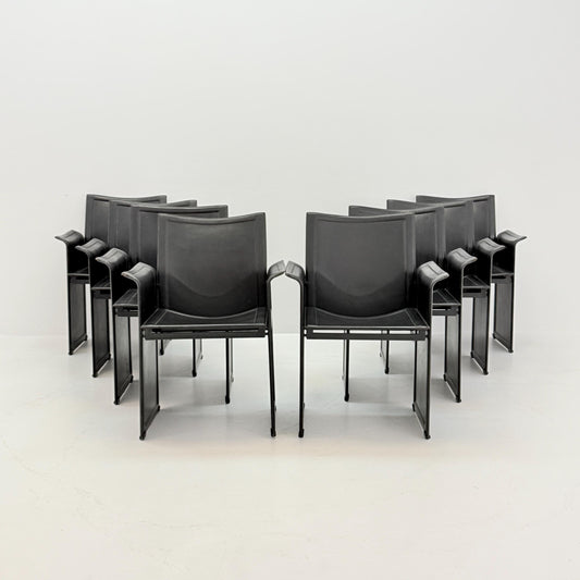 Set of 8 Mid-Century Italian “Korium” KM1 Black Leather Armchair by Tito Agnoli for Matteo Grassi, 1970s Italy