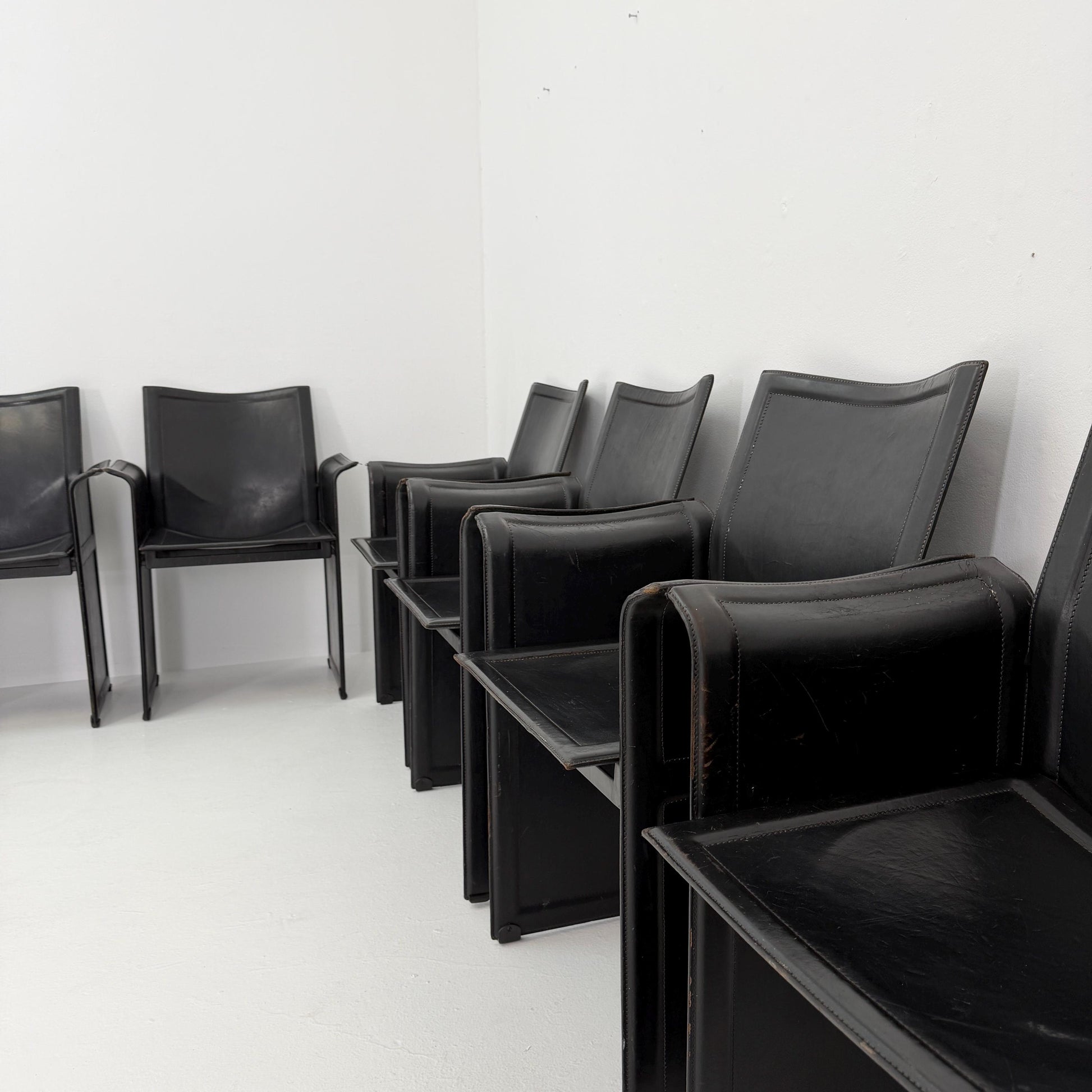 Set of 8 Mid-Century Italian “Korium” KM1 Black Leather Armchair by Tito Agnoli for Matteo Grassi, 1970s Italy