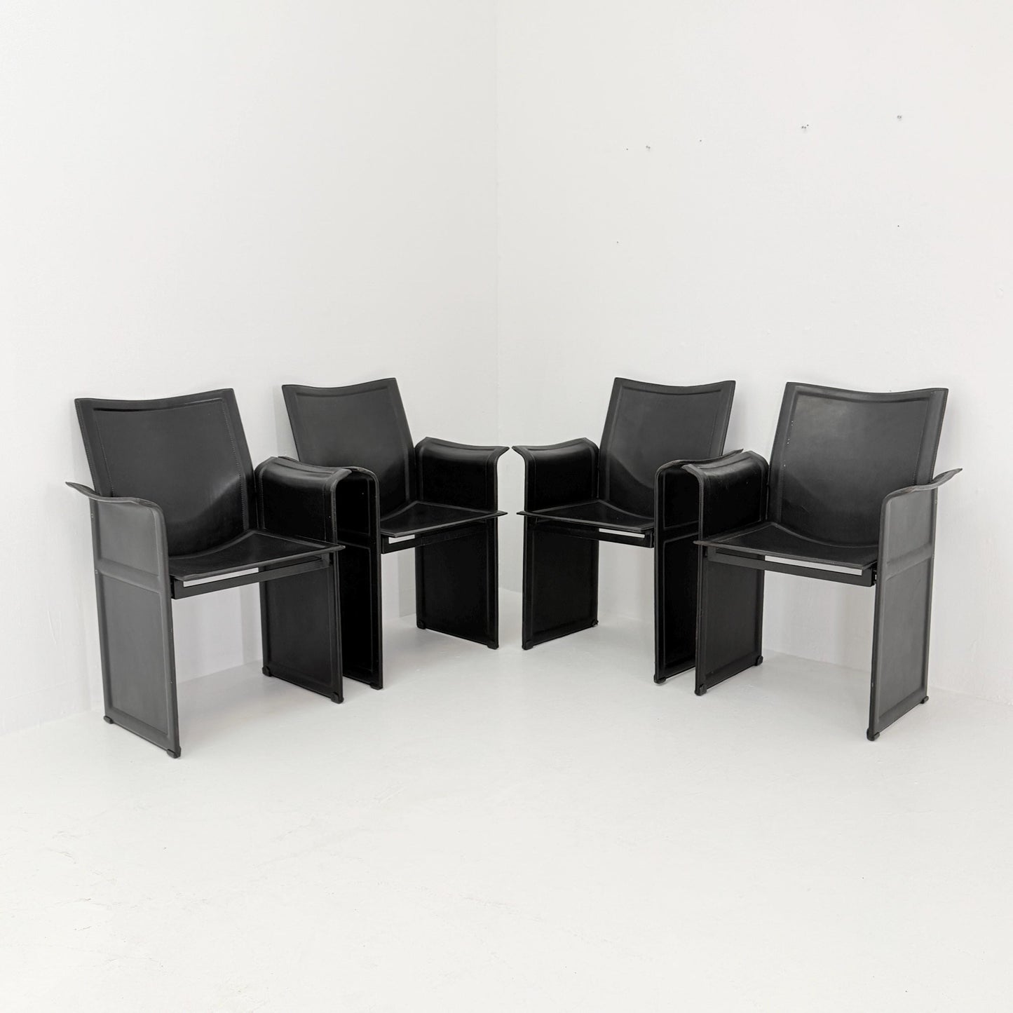 Set of 4 Mid-Century Italian “Korium” KM1 Black Leather Armchair by Tito Agnoli for Matteo Grassi, 1970s Italy