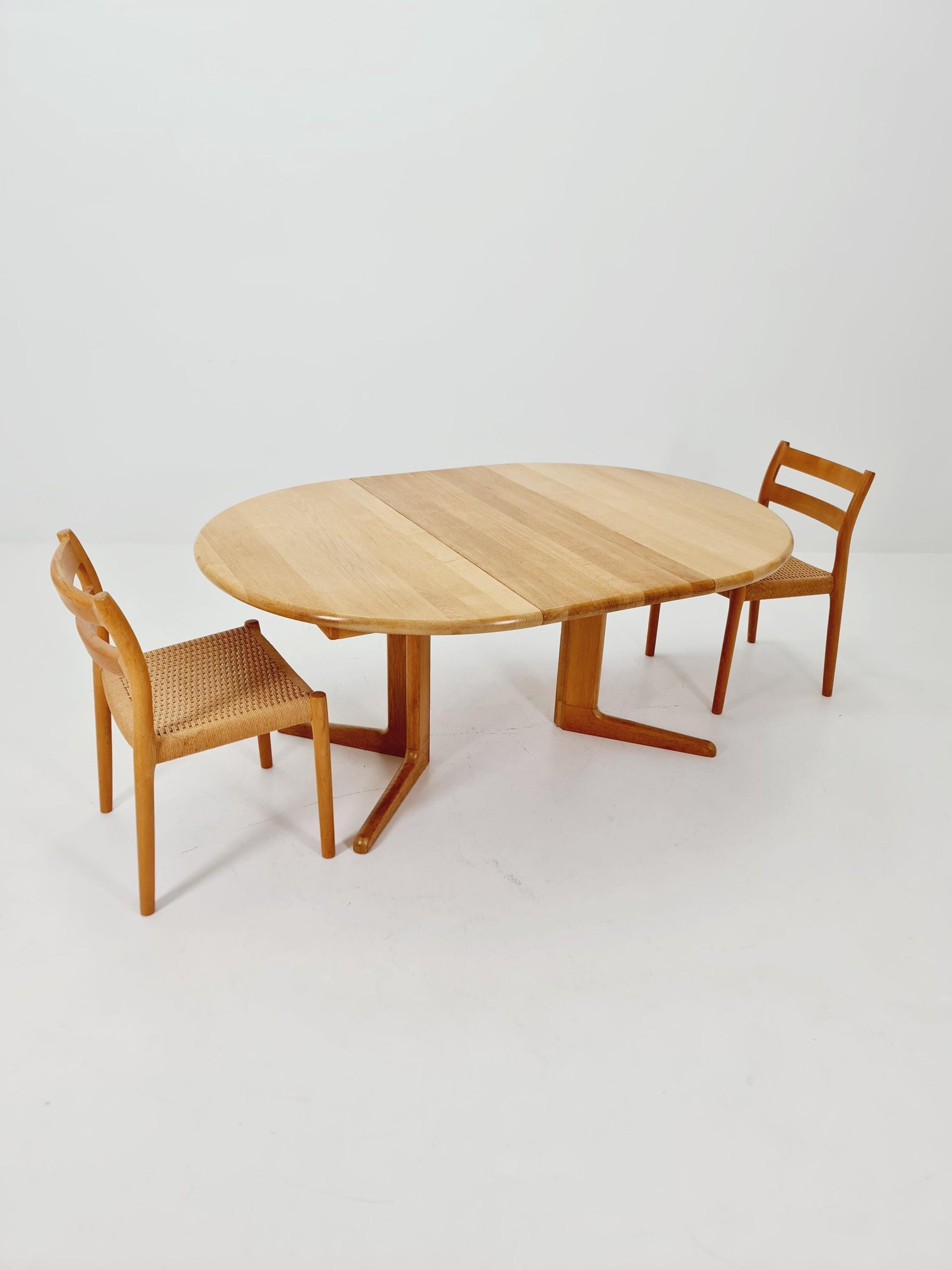 Mid century extendable Danish Modern Solid Oak dining table by Niels Möller , 1970s