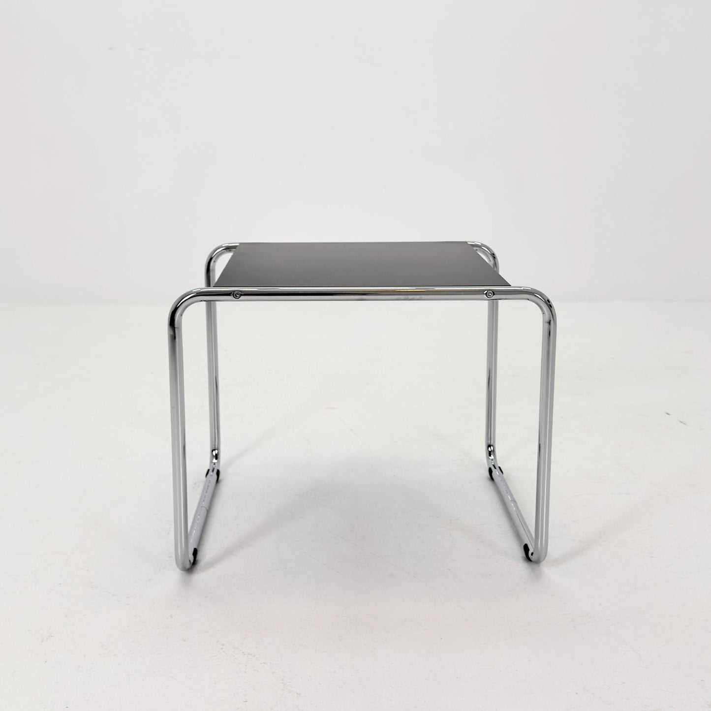 Mid century Bauhaus Marcel Breuer - Laccio Side coffee Table black Laminated Top with Tubular Chromed Base 1980s Itlay