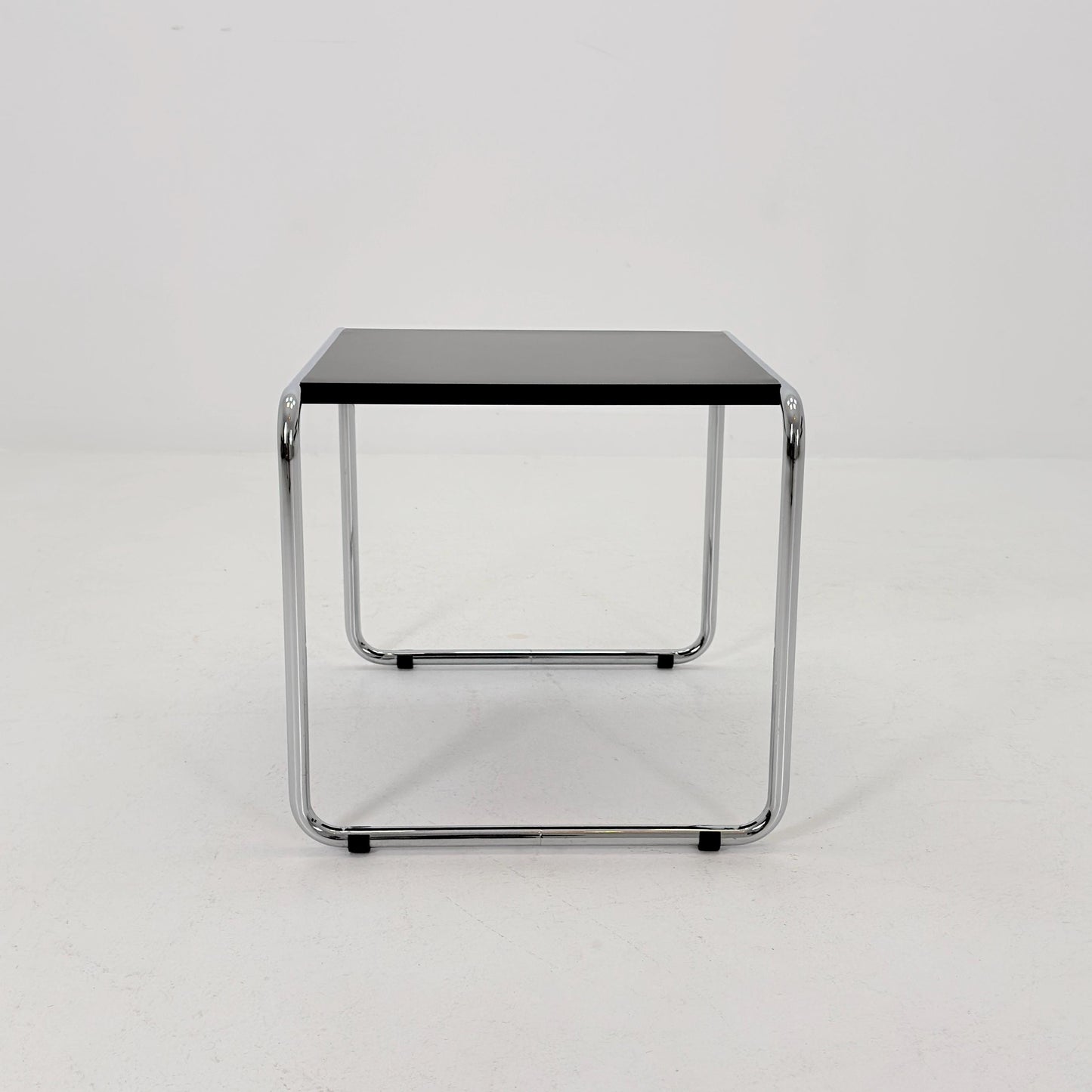 Mid century Bauhaus Marcel Breuer - Laccio Side coffee Table black Laminated Top with Tubular Chromed Base 1980s Itlay