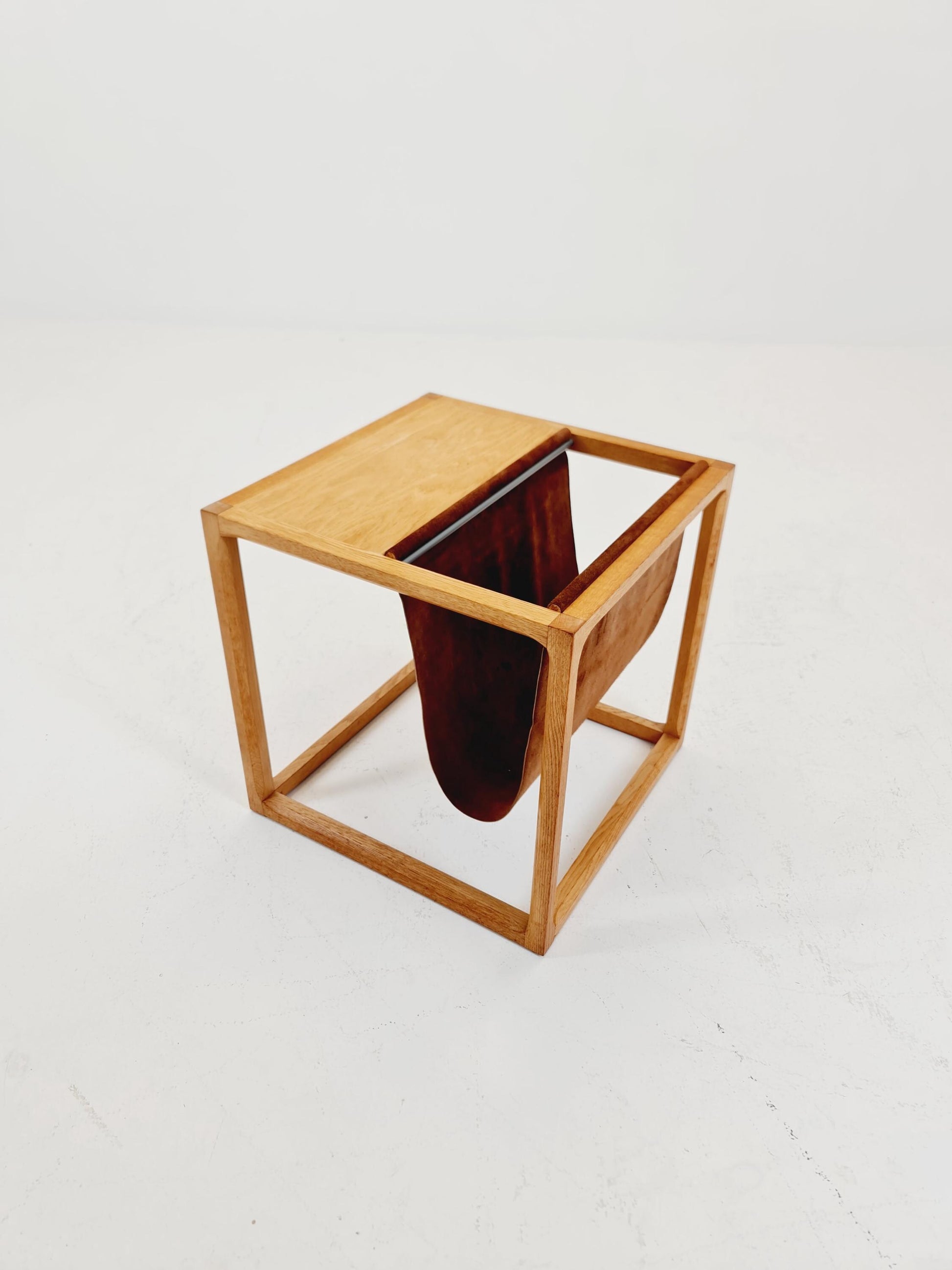 Midcentury Danish teak side table with Magazine Leather Pouch by Aksel kjersgaard 1960s