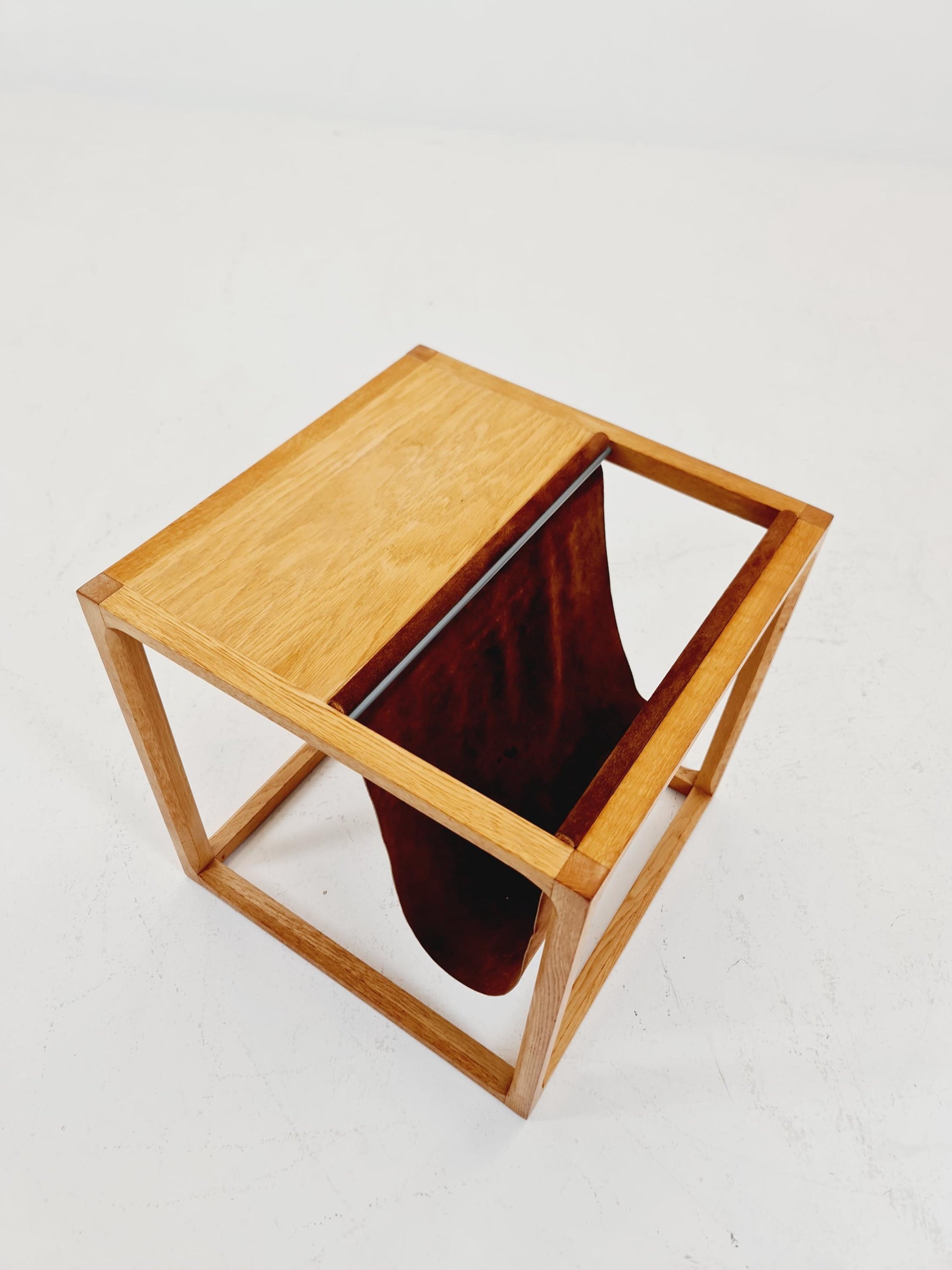 Midcentury Danish teak side table with Magazine Leather Pouch by Aksel kjersgaard 1960s