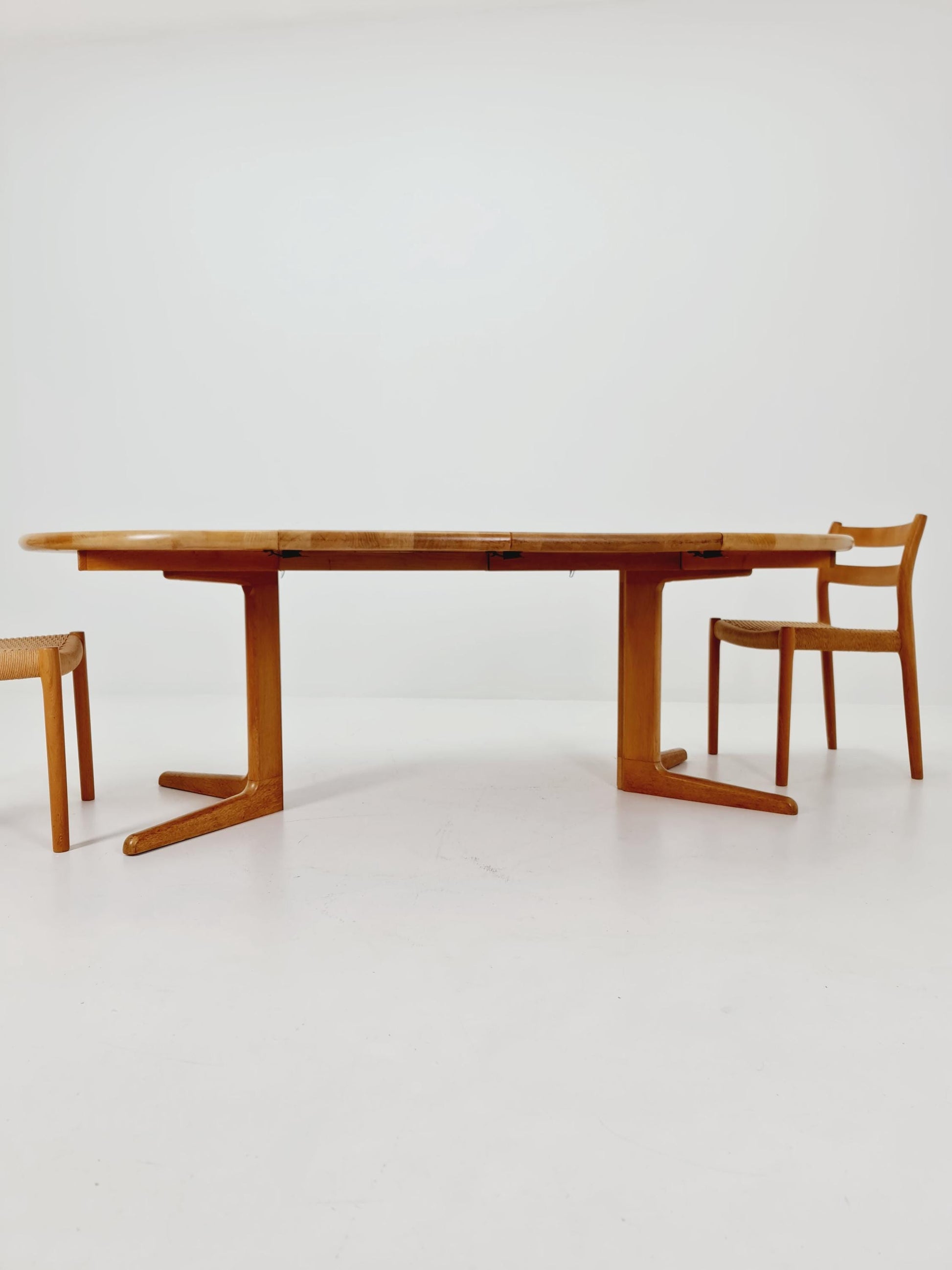 Mid century extendable Danish Modern Solid Oak dining table by Niels Möller , 1970s