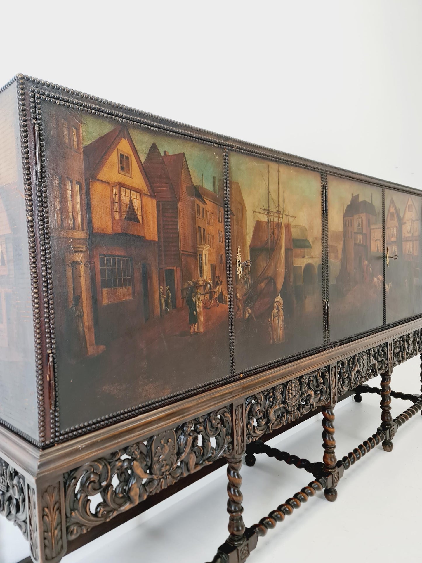 Extraordinary 1920s Ornate Carved Wood Buffet Cabinet with Hand-Painted Leather