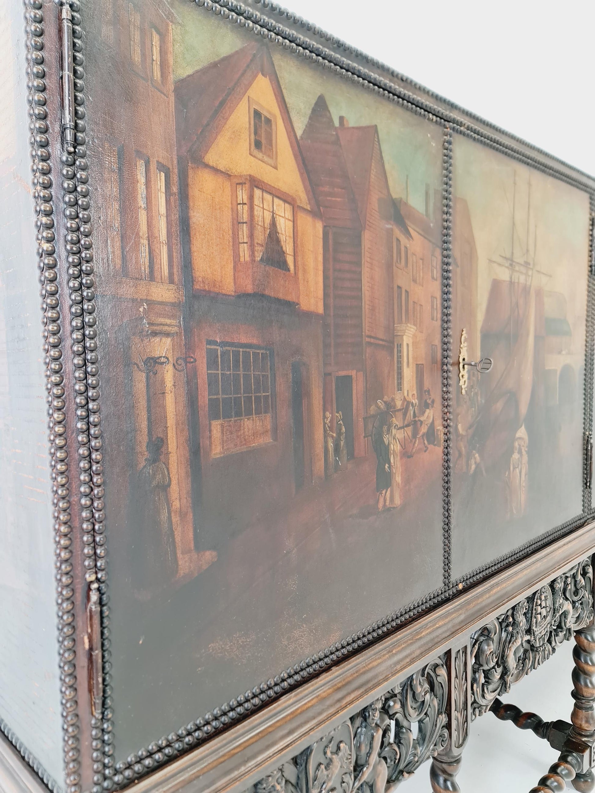 Extraordinary 1920s Ornate Carved Wood Buffet Cabinet with Hand-Painted Leather