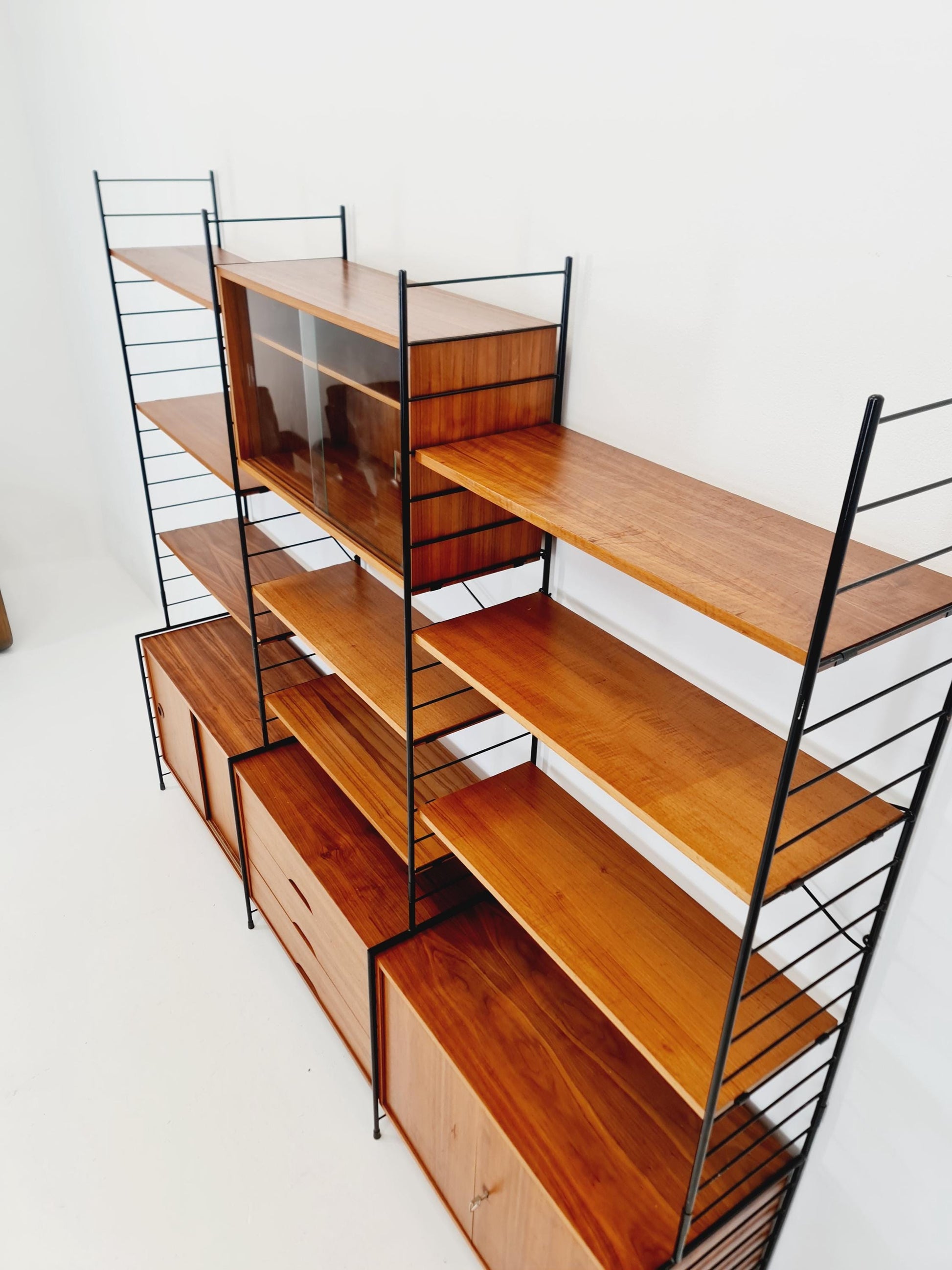 Mid century String shelf-system, bookcase with 3 cabinet and show case walnut wood by WHB Germany, 1950s