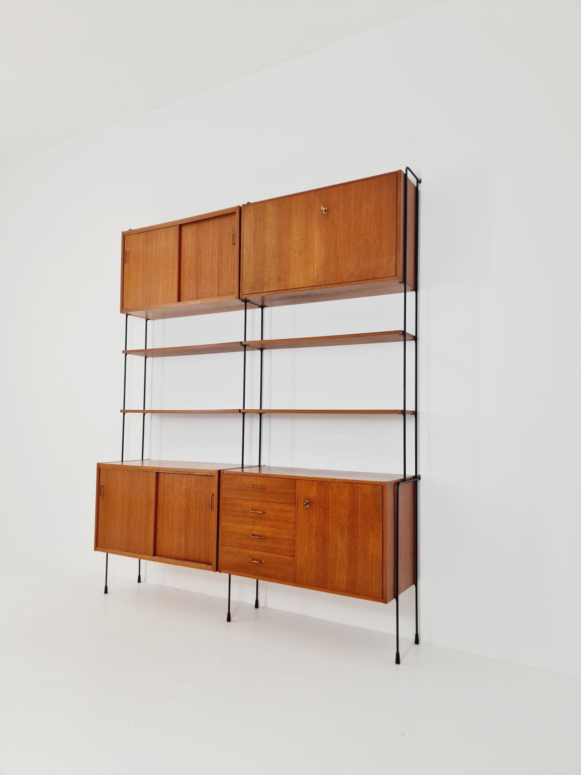 Mid century teak wall shelving unit by Hilker for Omnia, Germany, 1960s