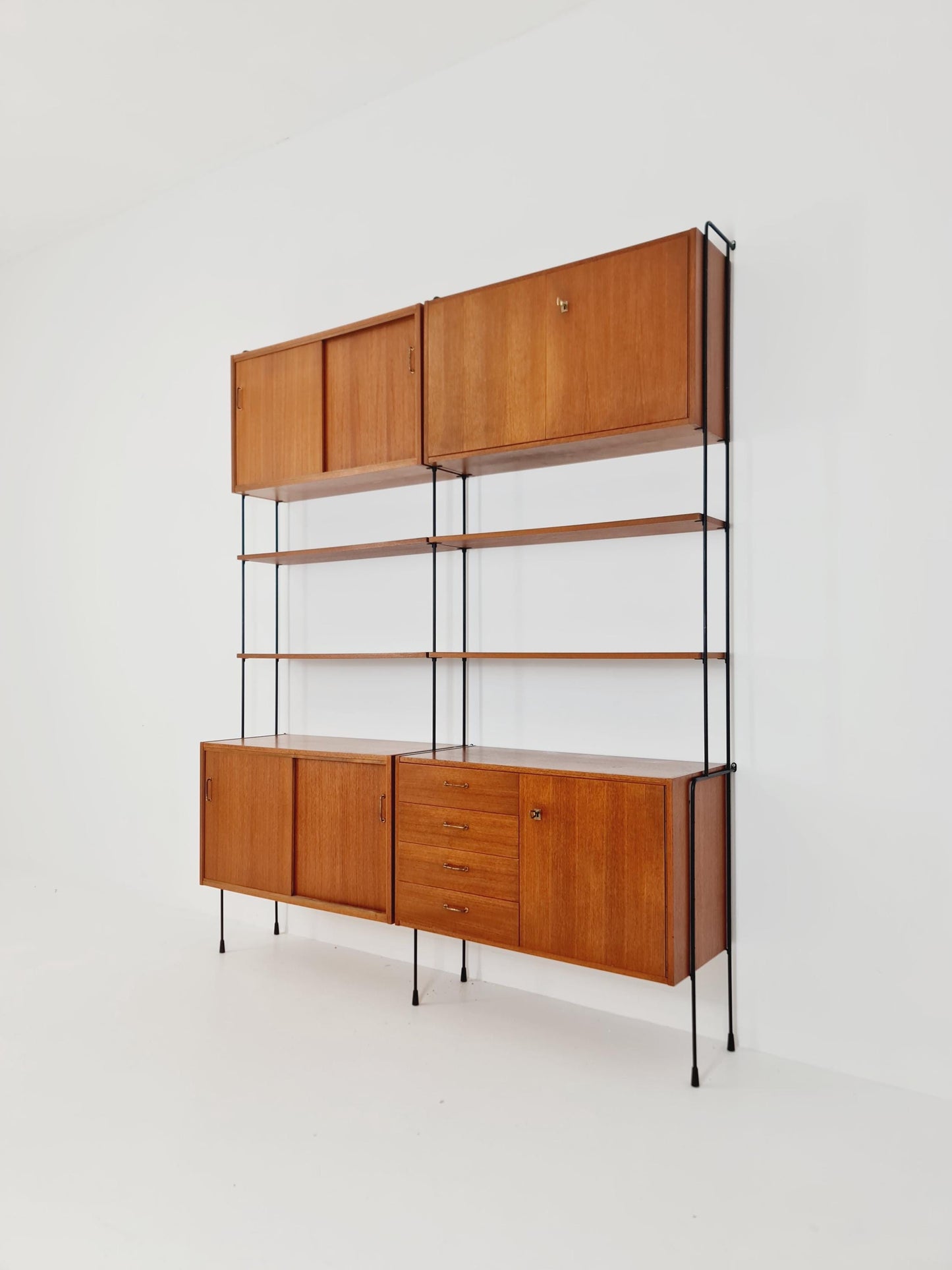 Mid century teak wall shelving unit by Hilker for Omnia, Germany, 1960s